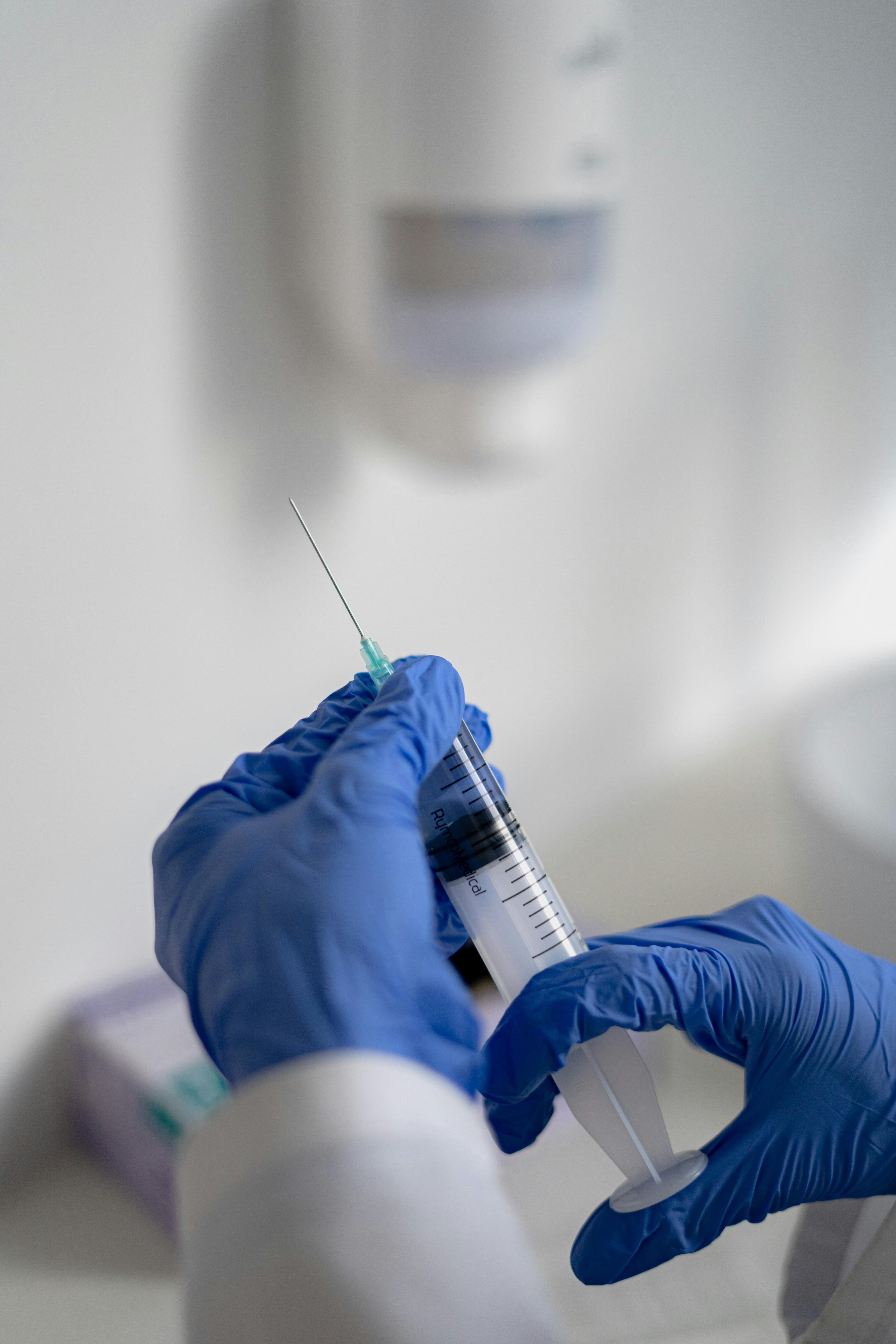Doctor administering intratympanic steroid injection, a common treatment for EOMI