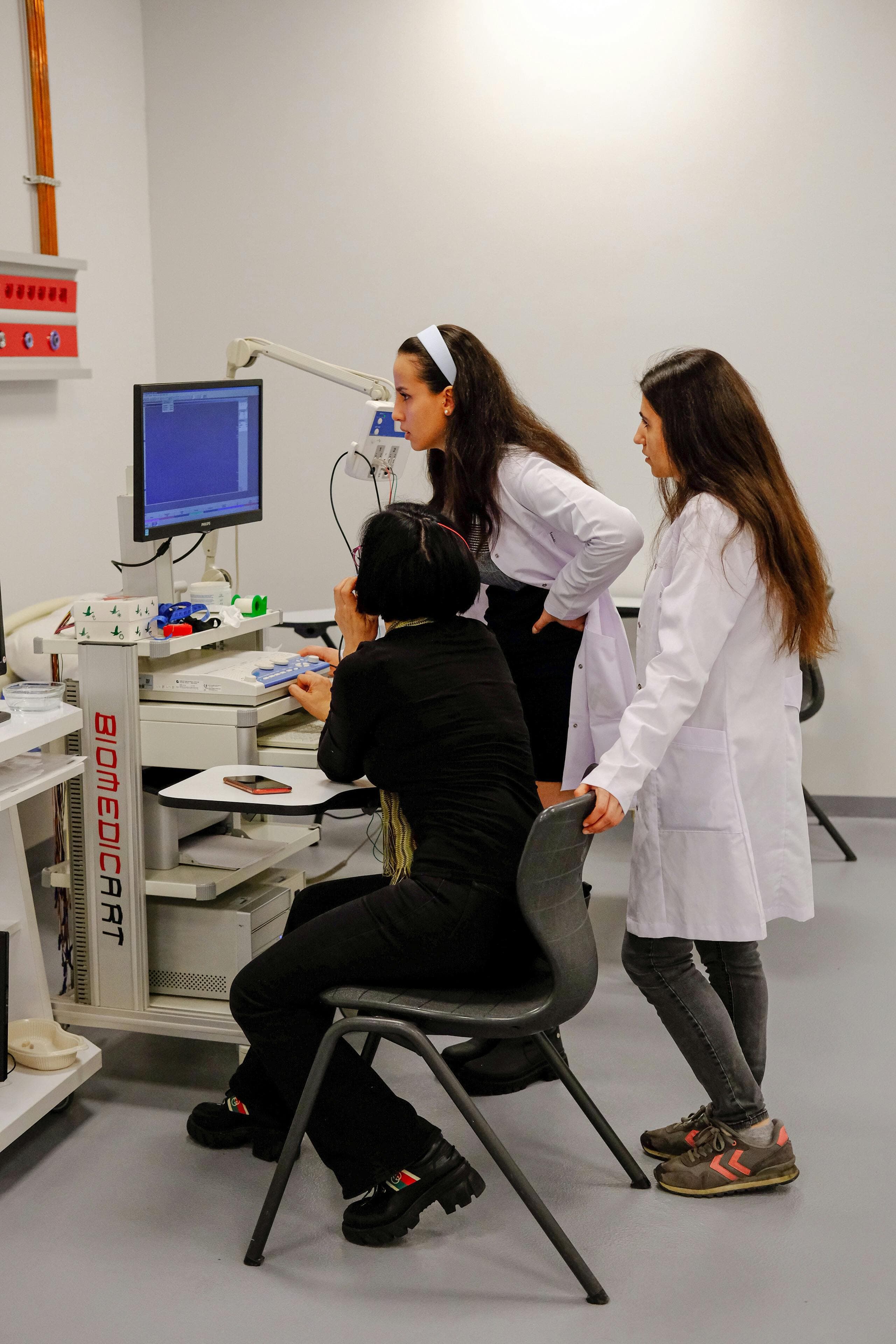Doctor analyzing patient data and correlating clinical findings