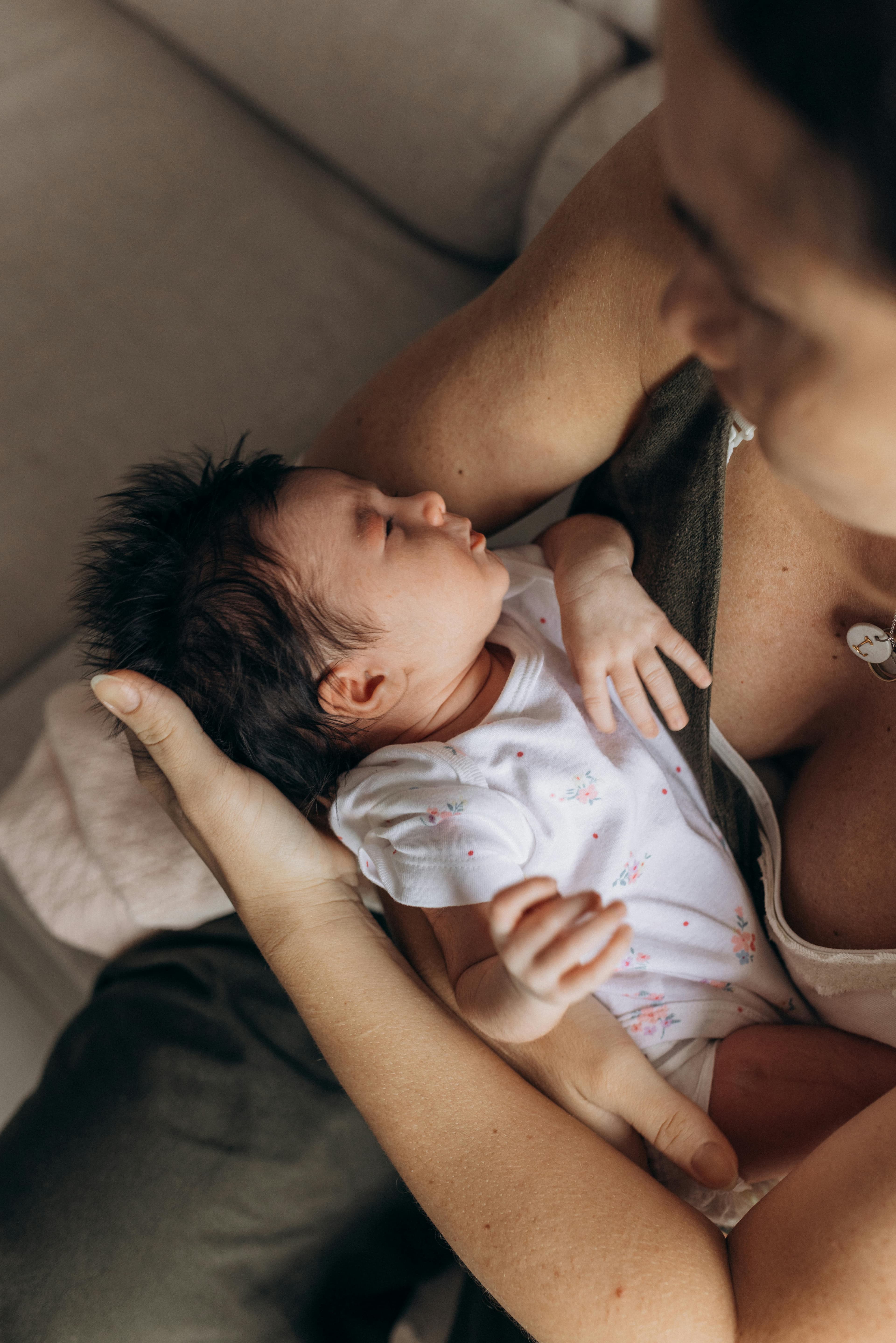 A peaceful sleeping baby with hands away from face