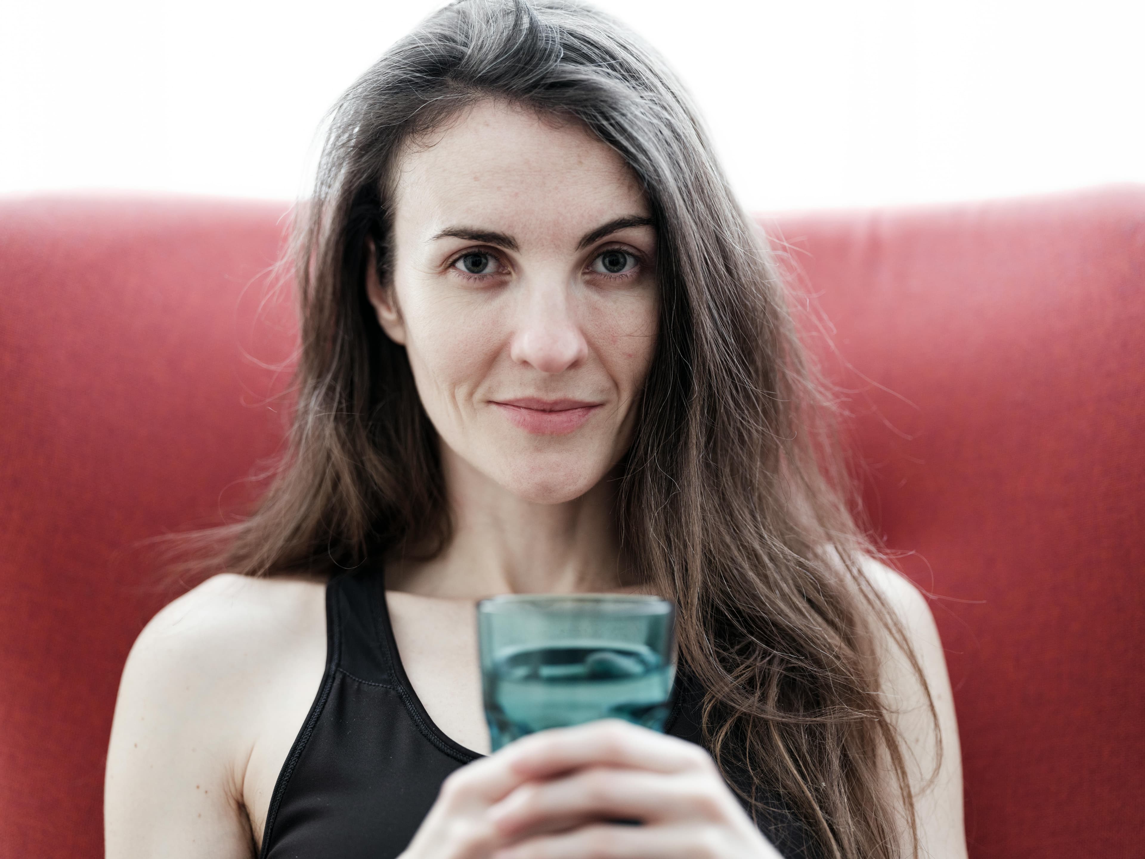 Person drinking water from a glass