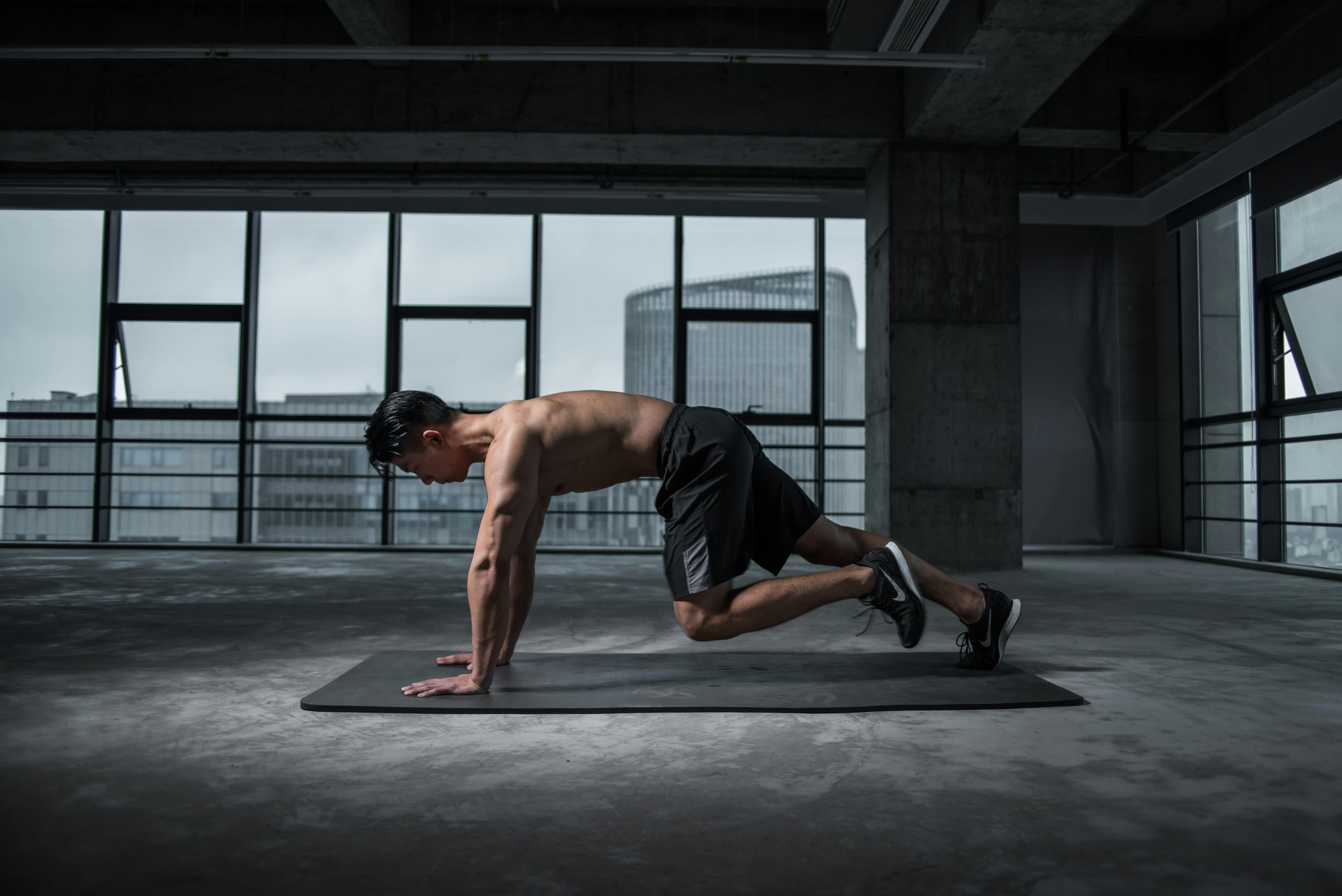 A person performing a plank exercise to strengthen core muscles