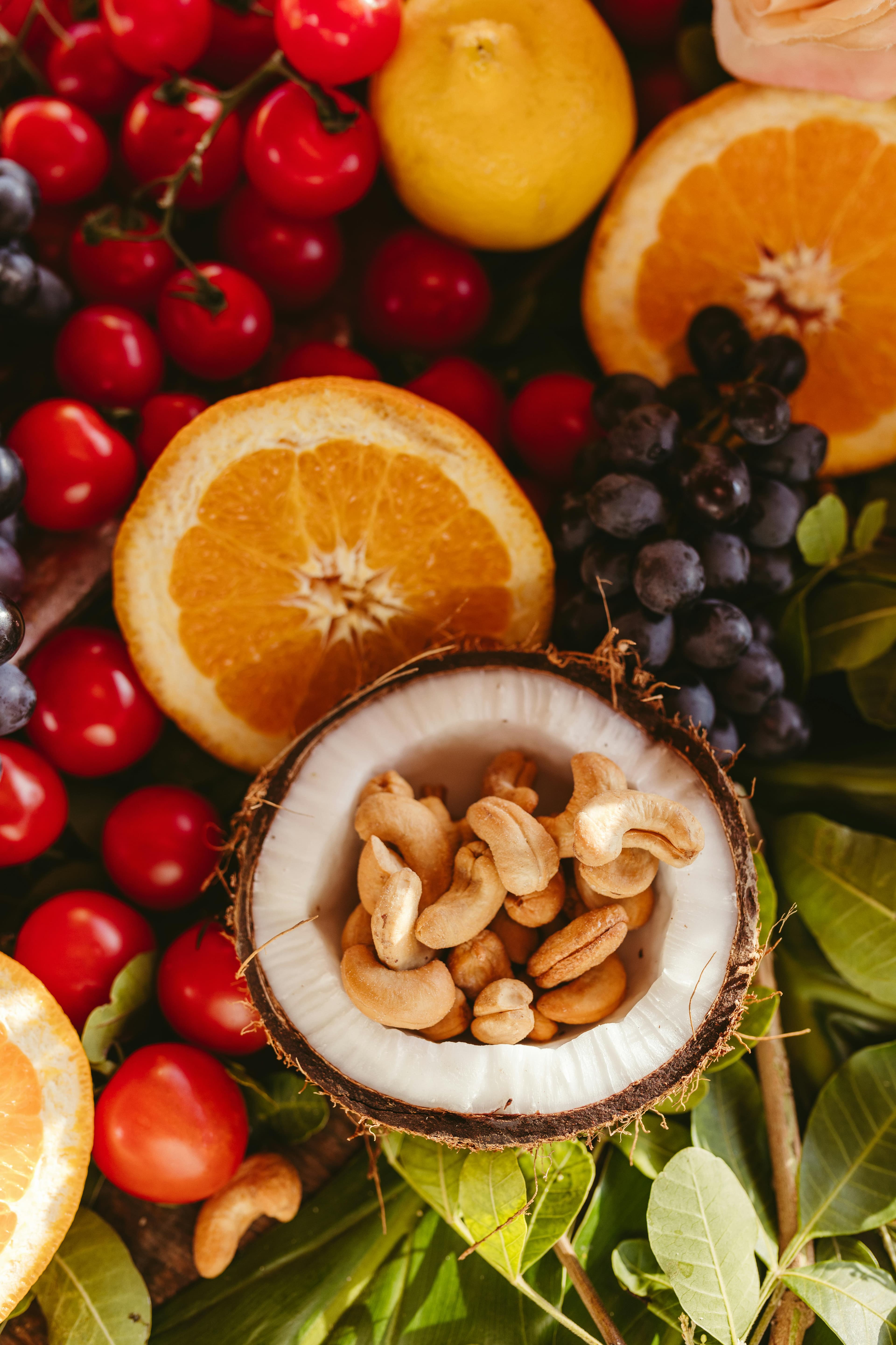 A variety of nutrient-rich foods beneficial for hair health, including nuts, eggs, leafy greens, and lean meats