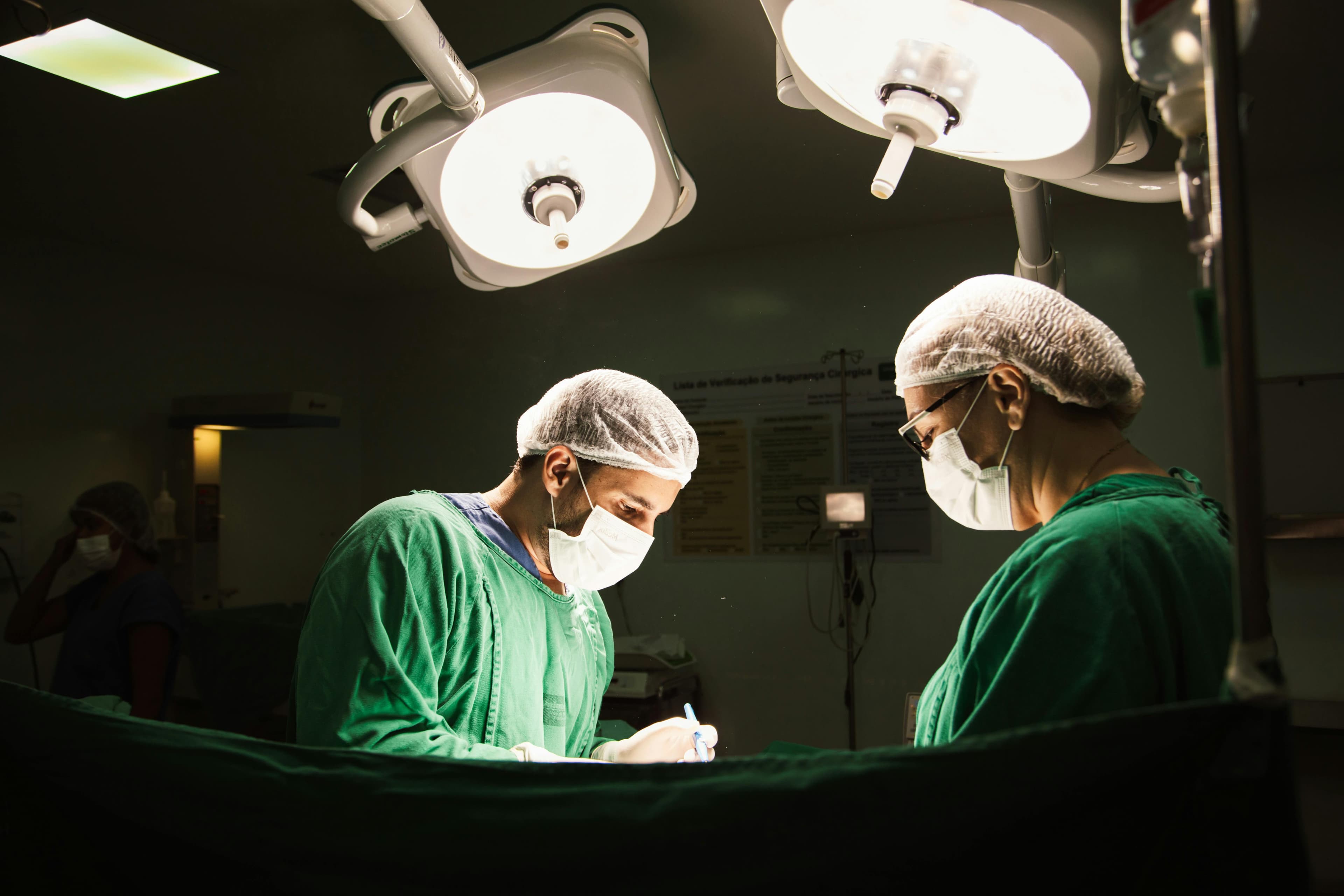 A surgeon performing a corneal transplant procedure