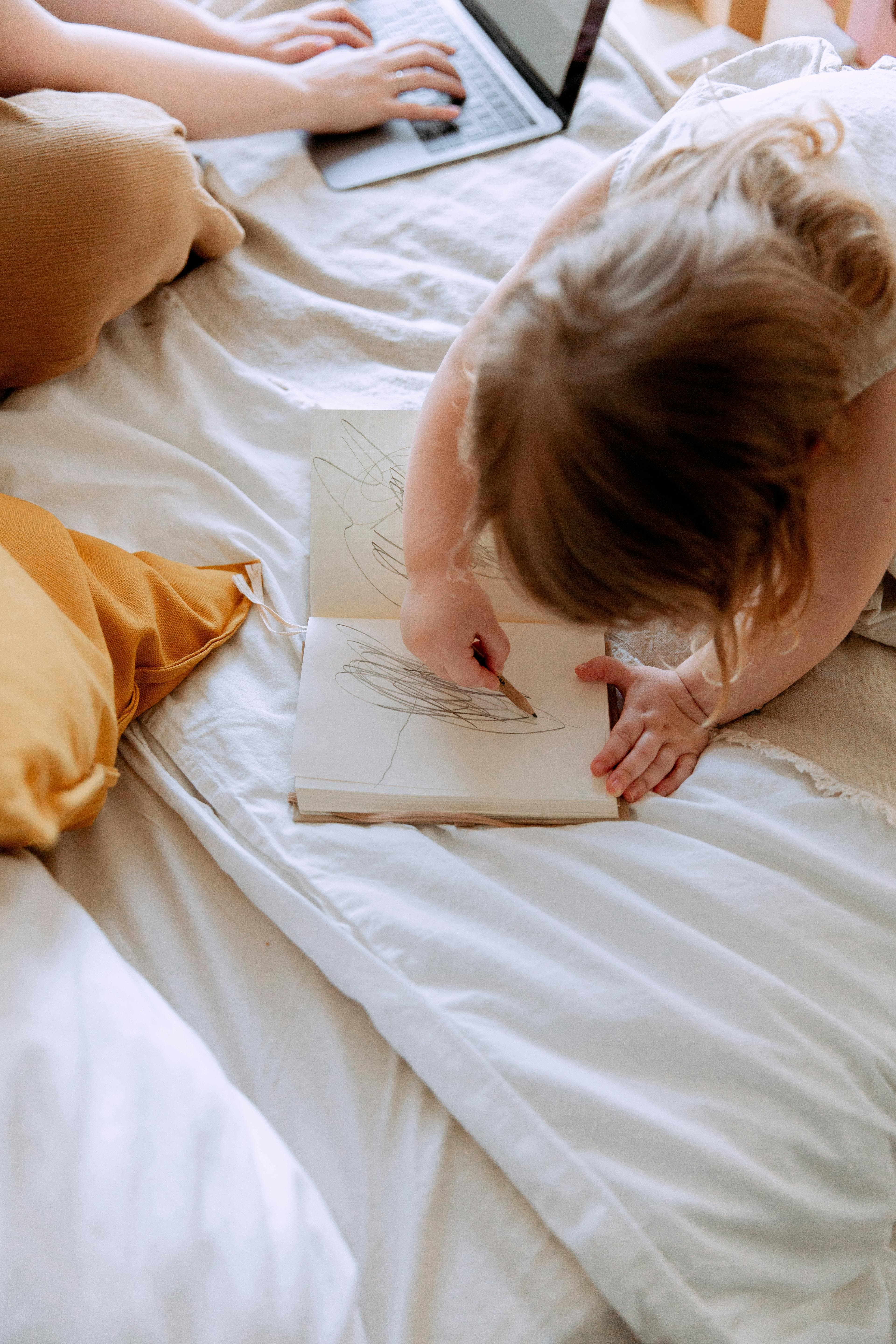 A parent using a nasal aspirator to clear a baby's congestion