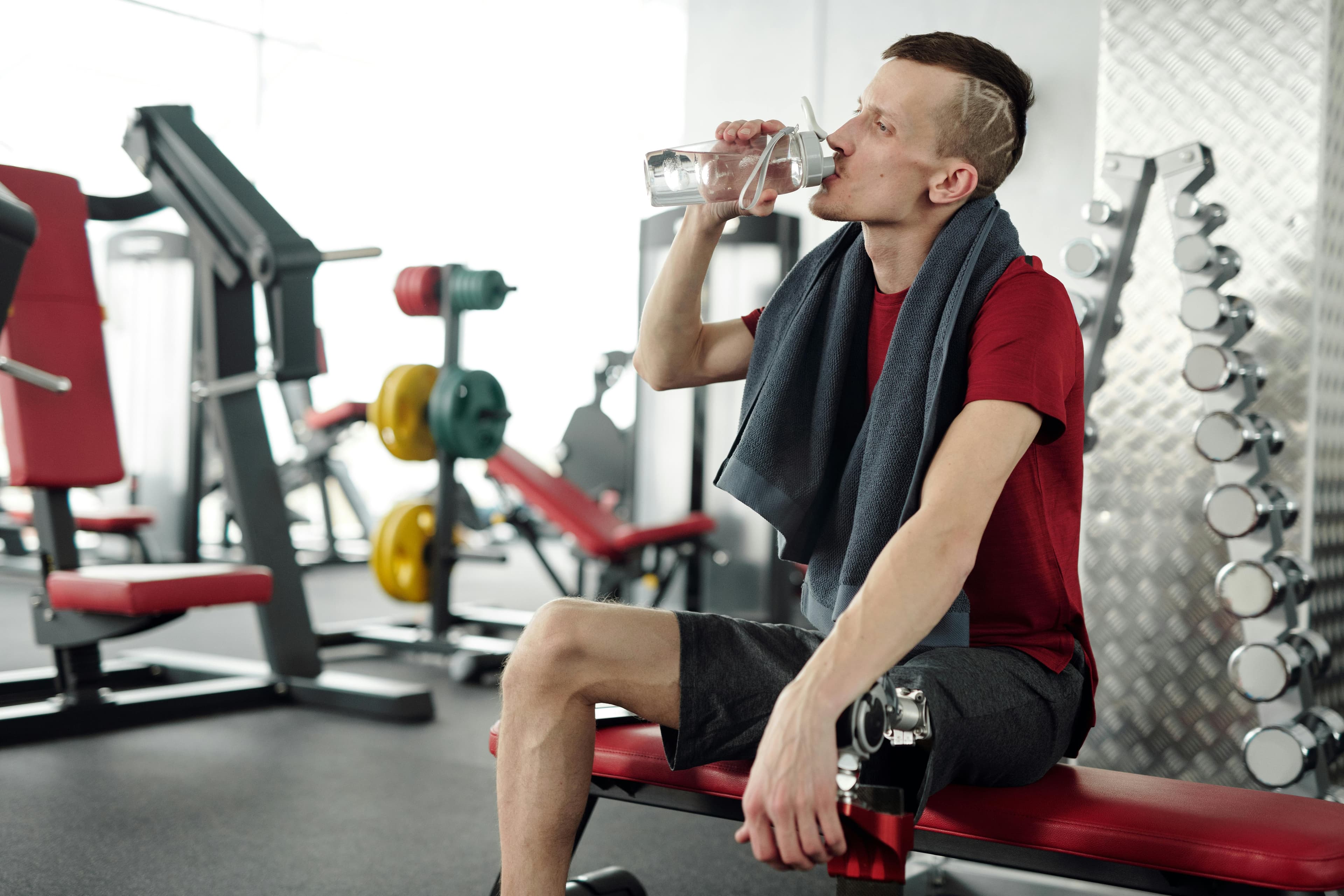 Person taking a screen break and drinking water