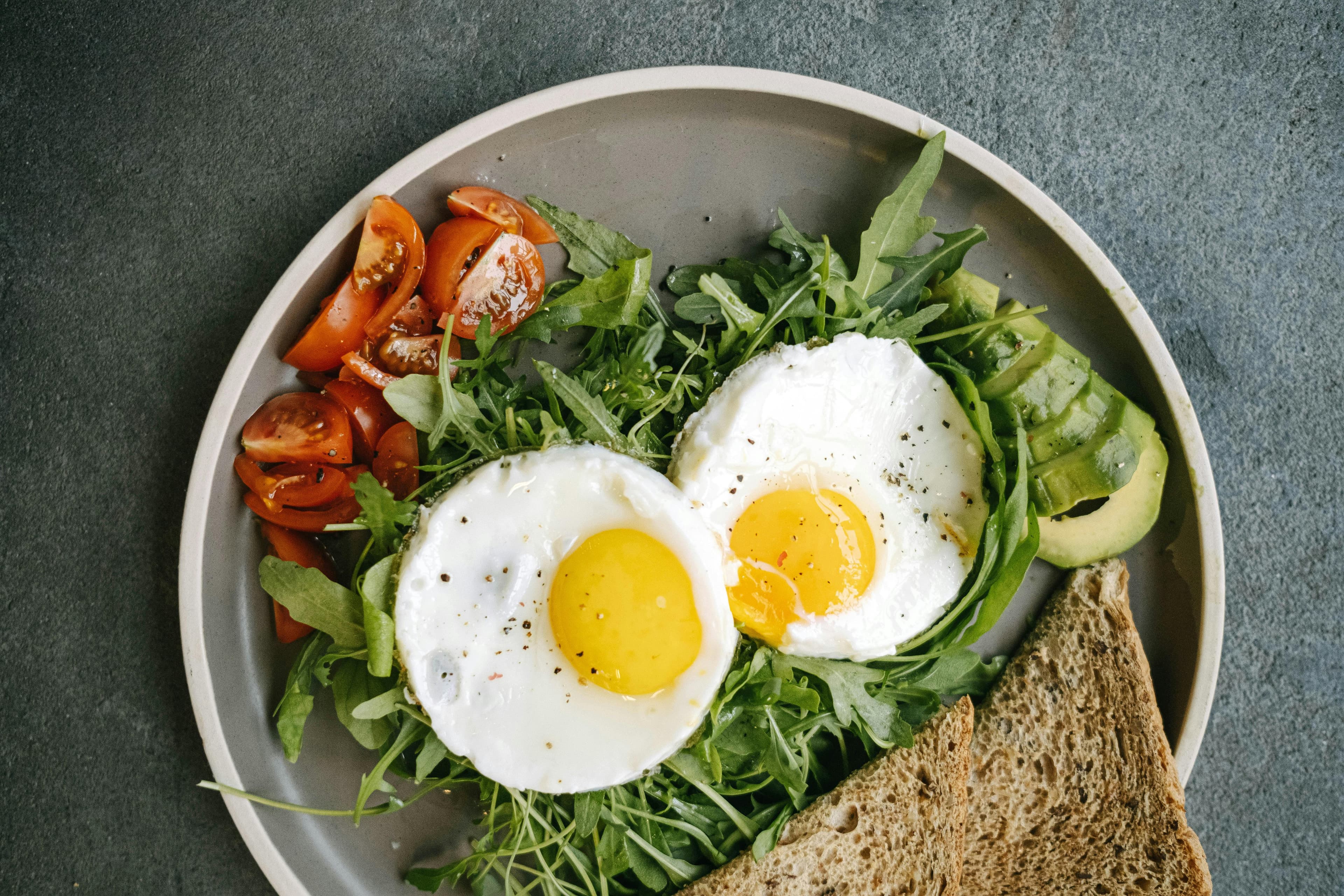 A balanced meal with lean protein, whole grains, and colorful vegetables on a plate
