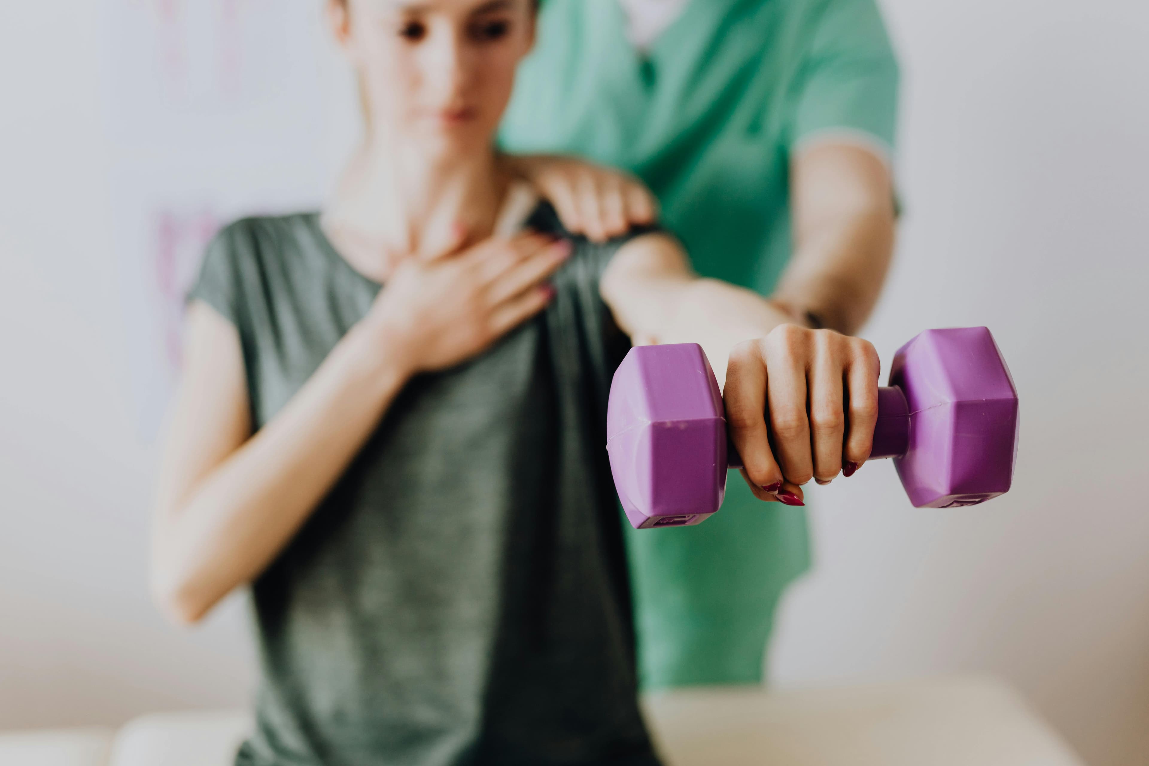 Patient performing shoulder rehabilitation exercises