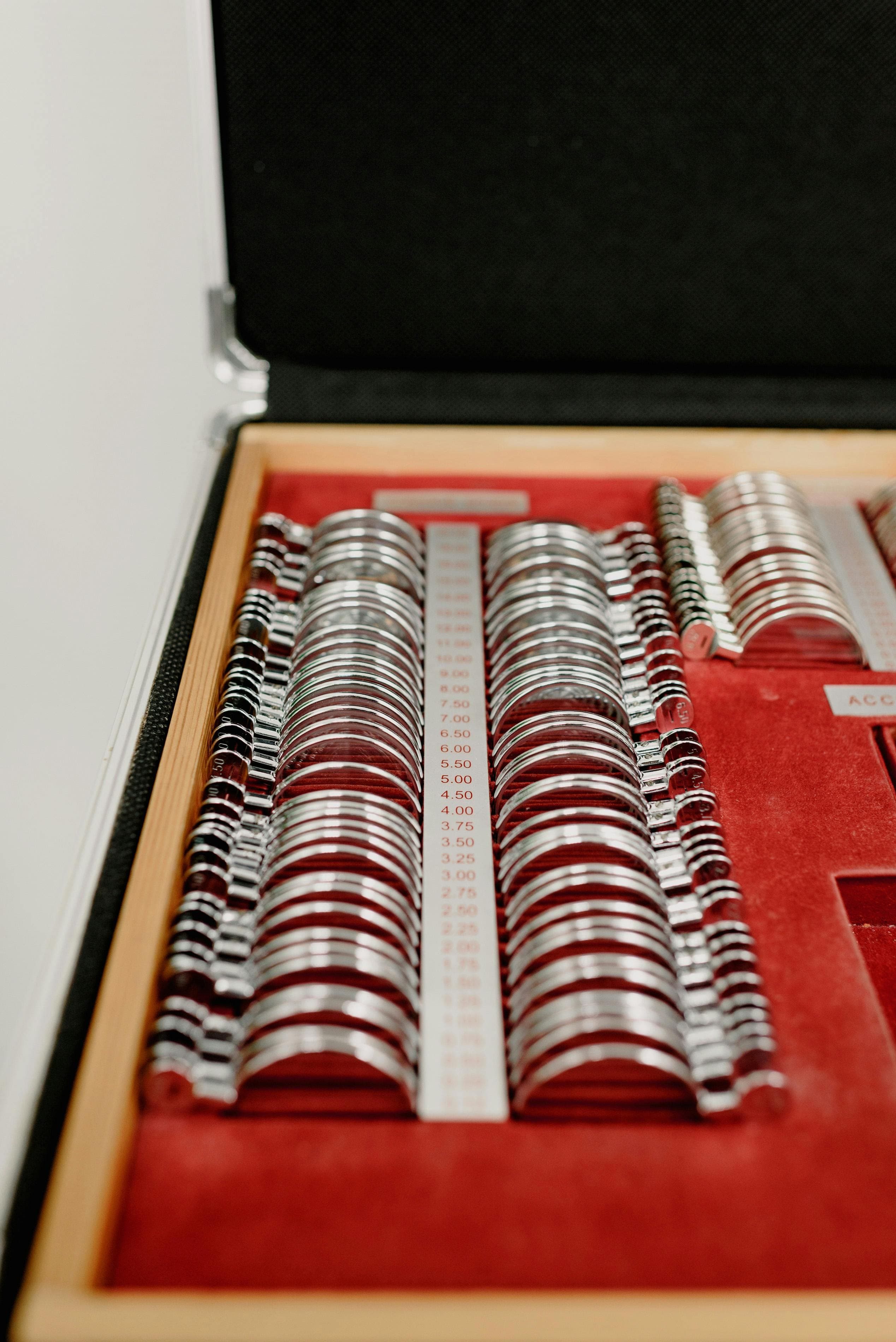 An open medicine cabinet with various over-the-counter medications and remedies