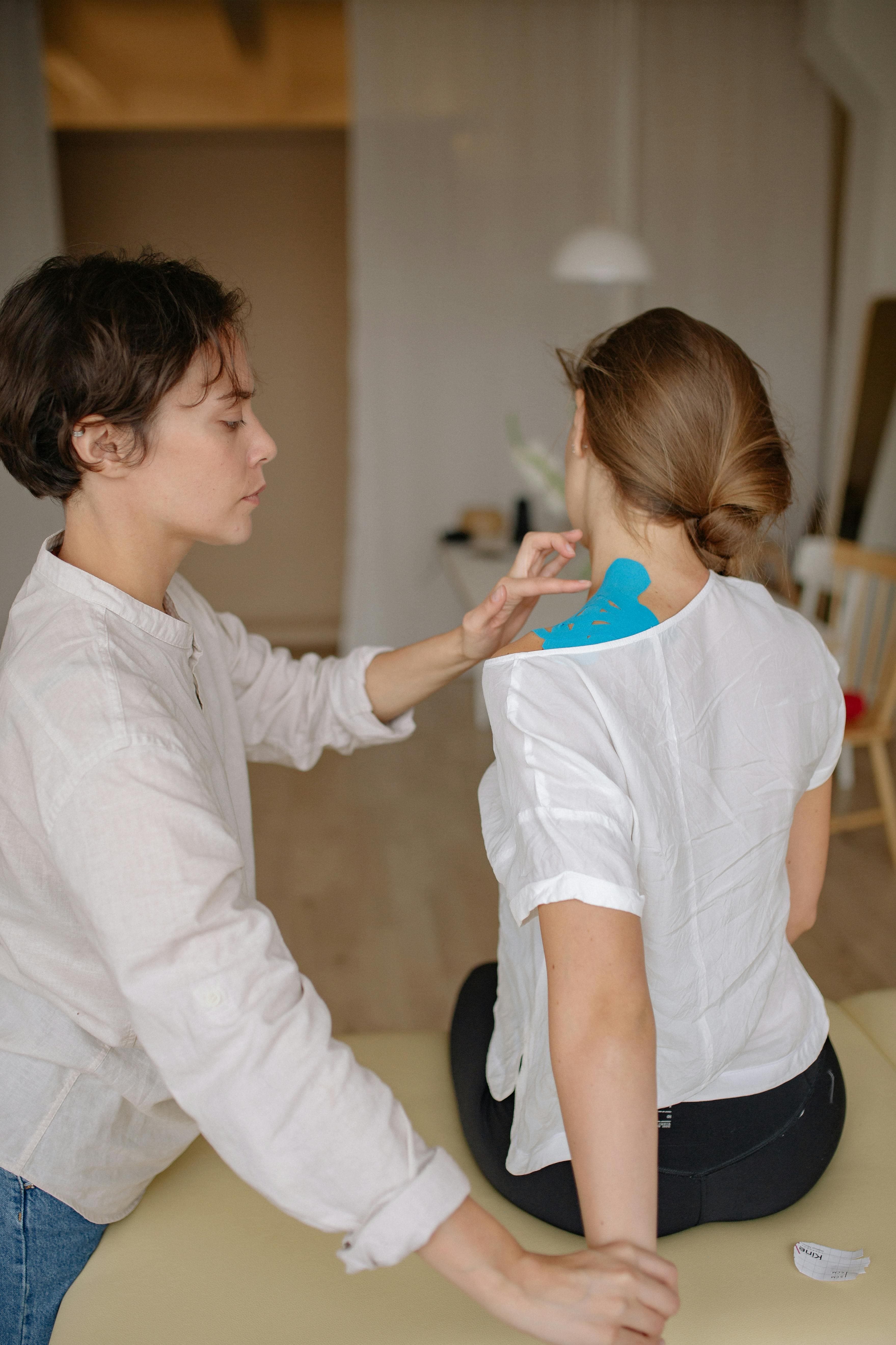 Patient undergoing physical therapy exercises for shoulder rehabilitation