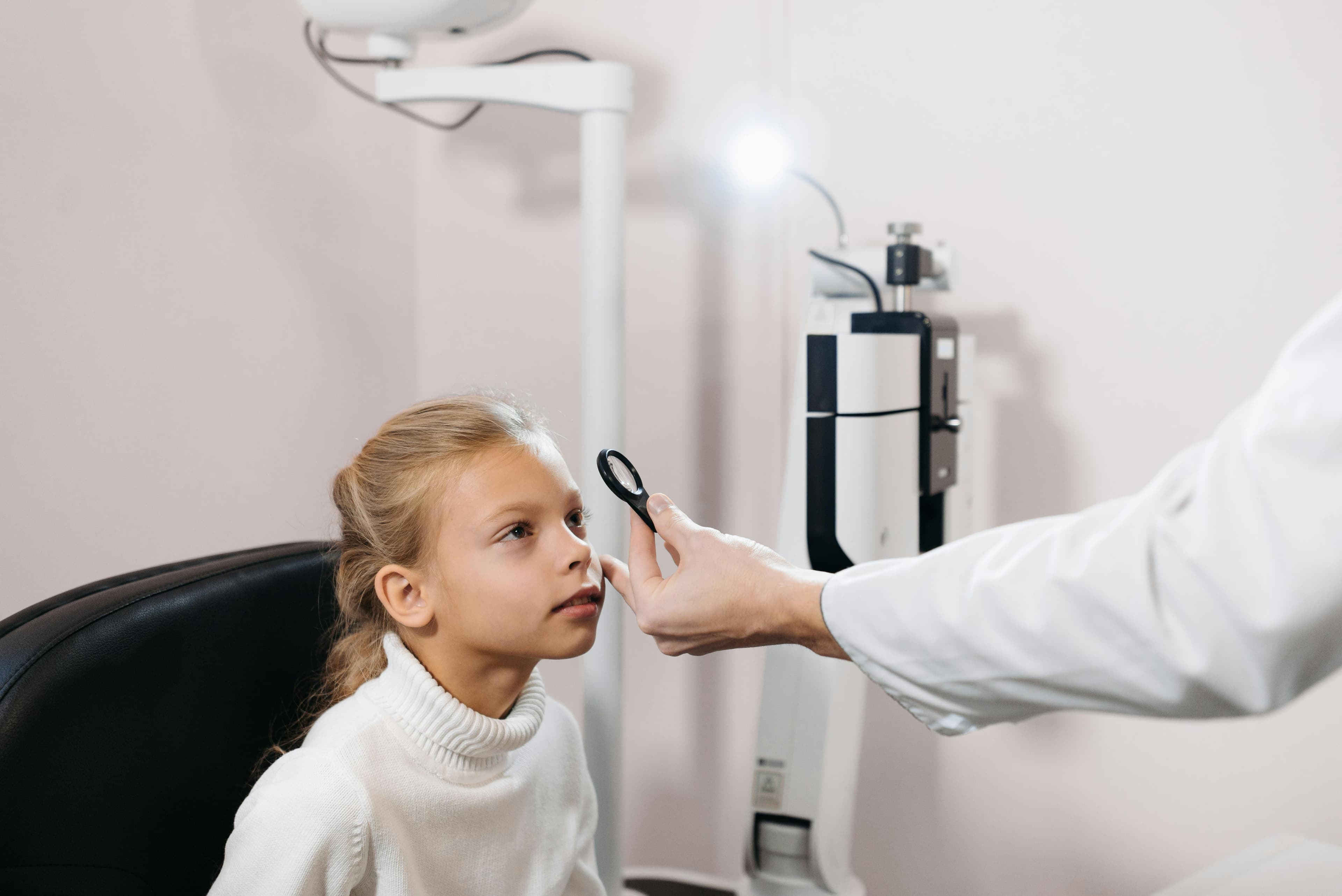 Eye doctor performing an eye examination
