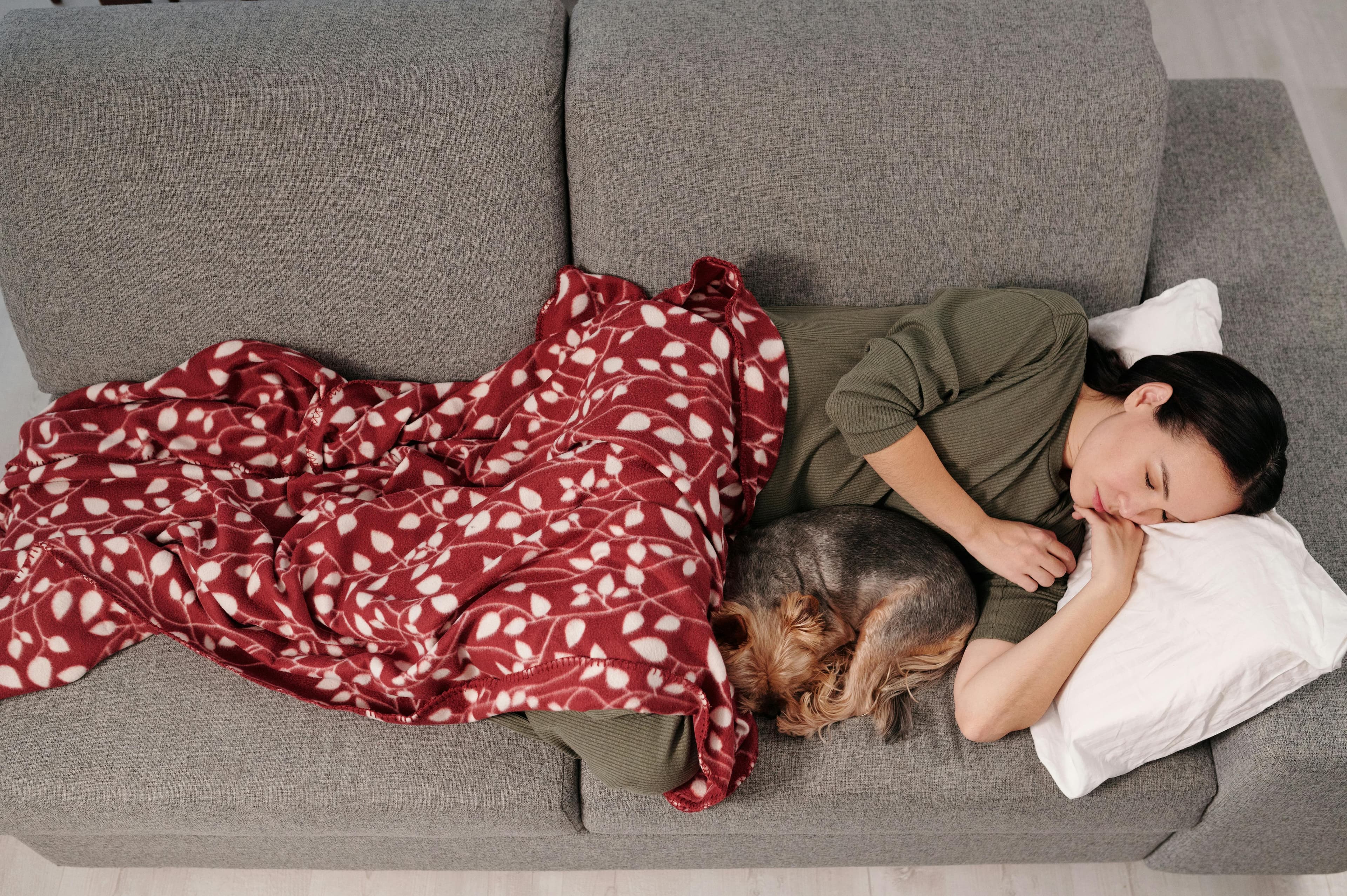 Person sleeping face down with special pillow after retinal surgery