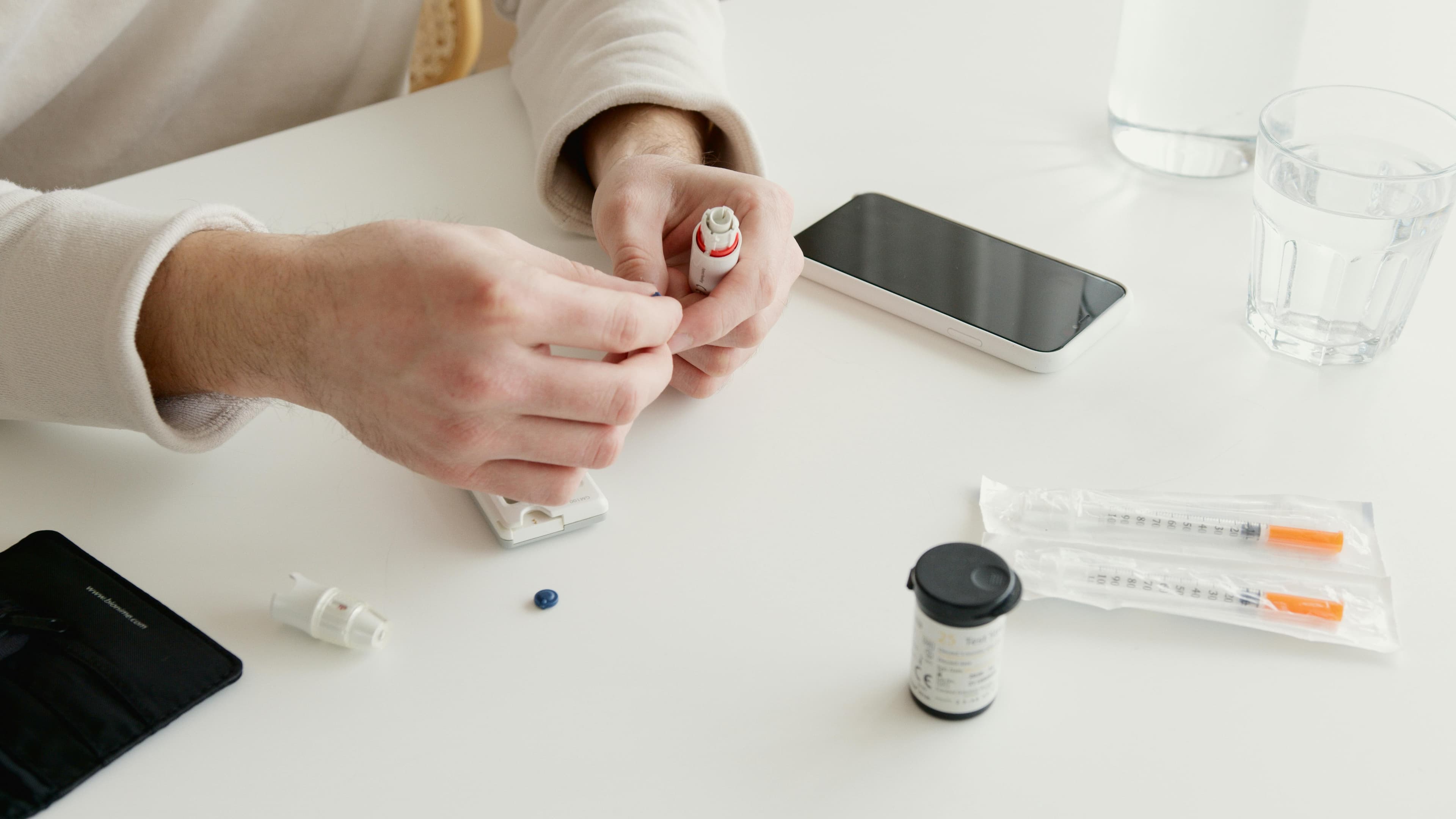 A doctor discussing test results with a patient, representing the importance of regular monitoring during testosterone therapy