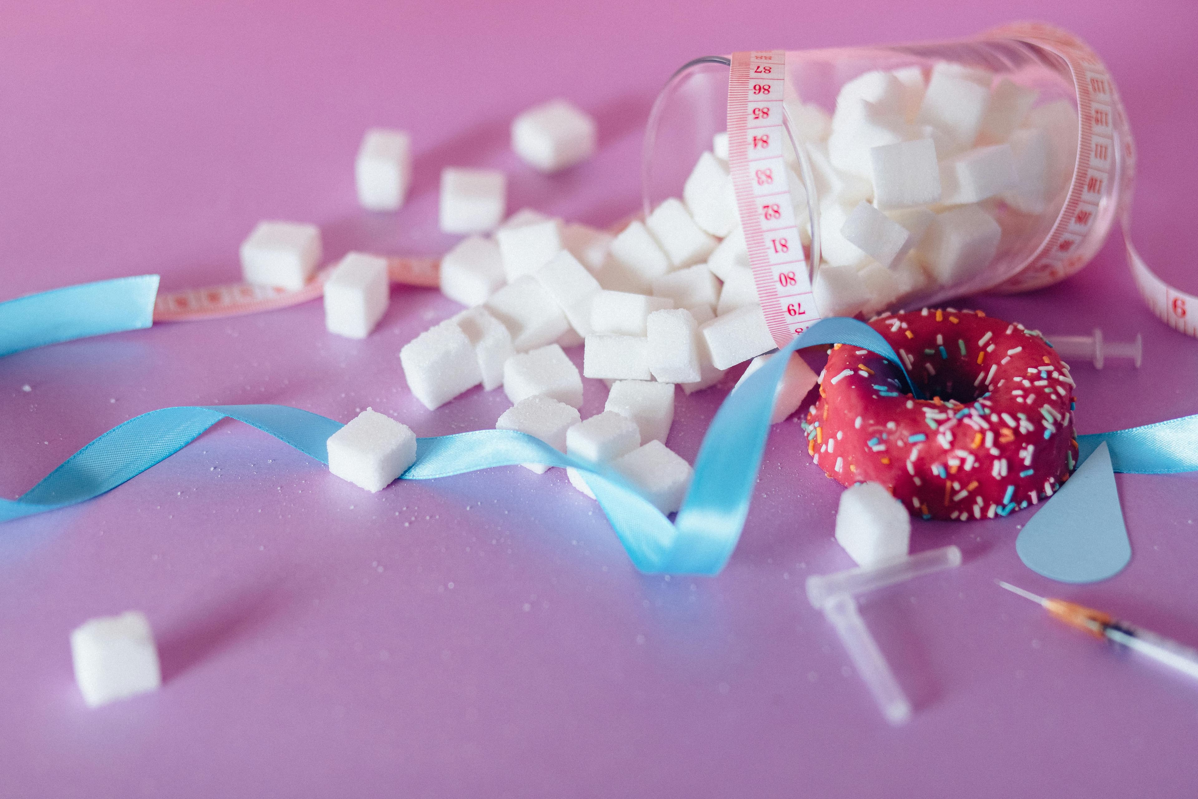 A graph showing blood sugar levels spiking after sugar consumption and then rapidly dropping