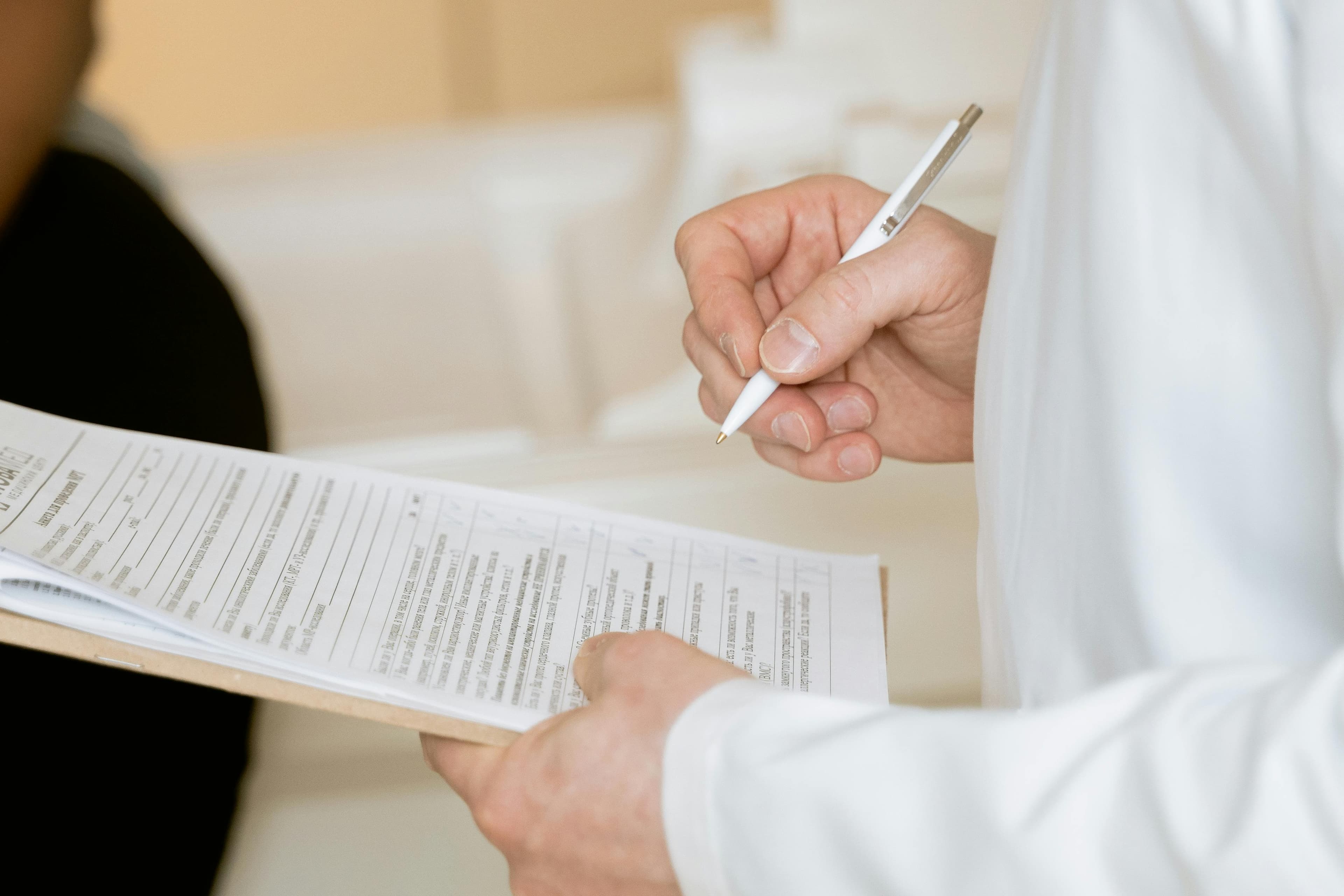 Doctor reviewing blood test results with a patient