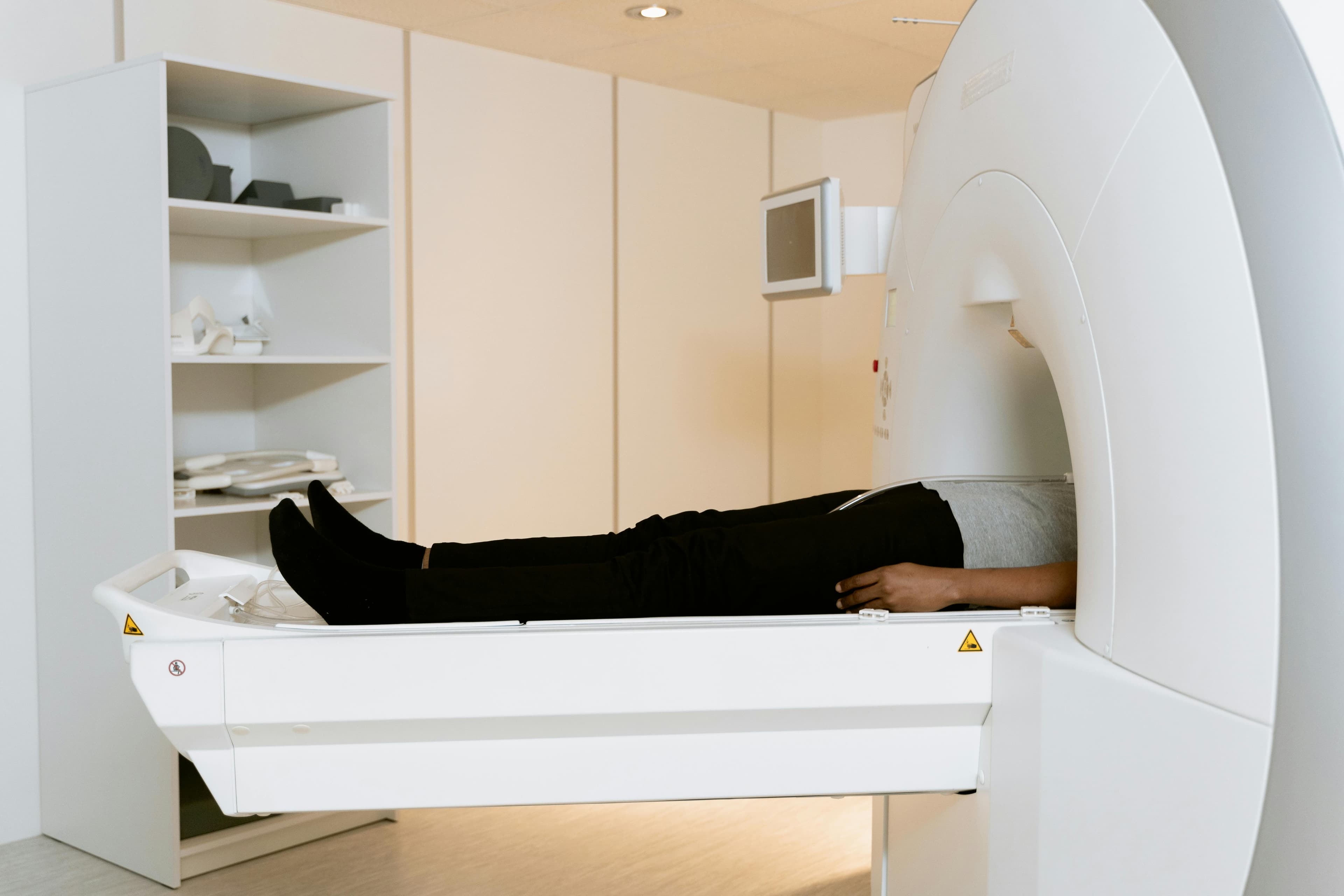 A physiotherapist conducting a personalized assessment for a hip replacement patient