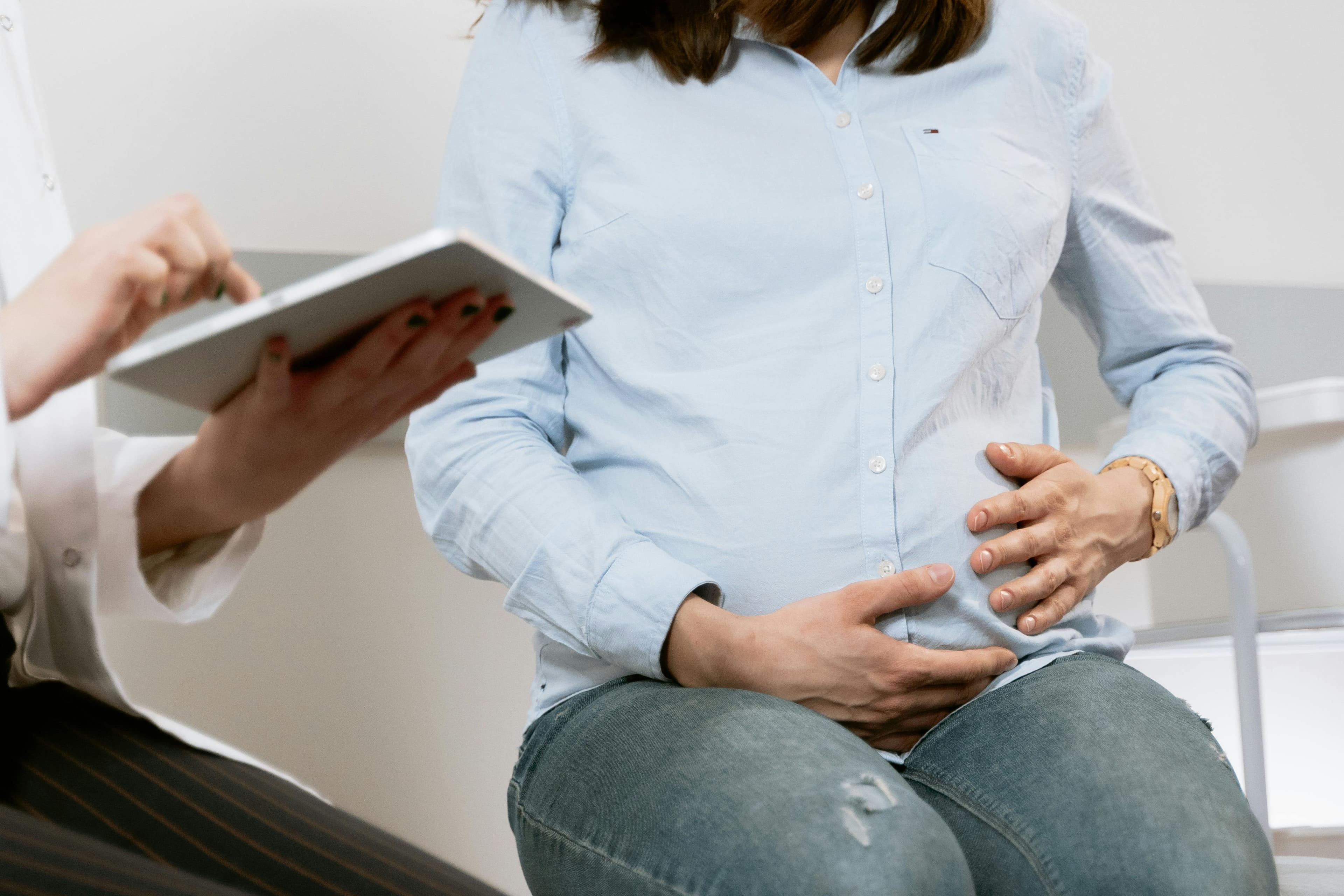Doctor consulting with patient about colonoscopy preparation