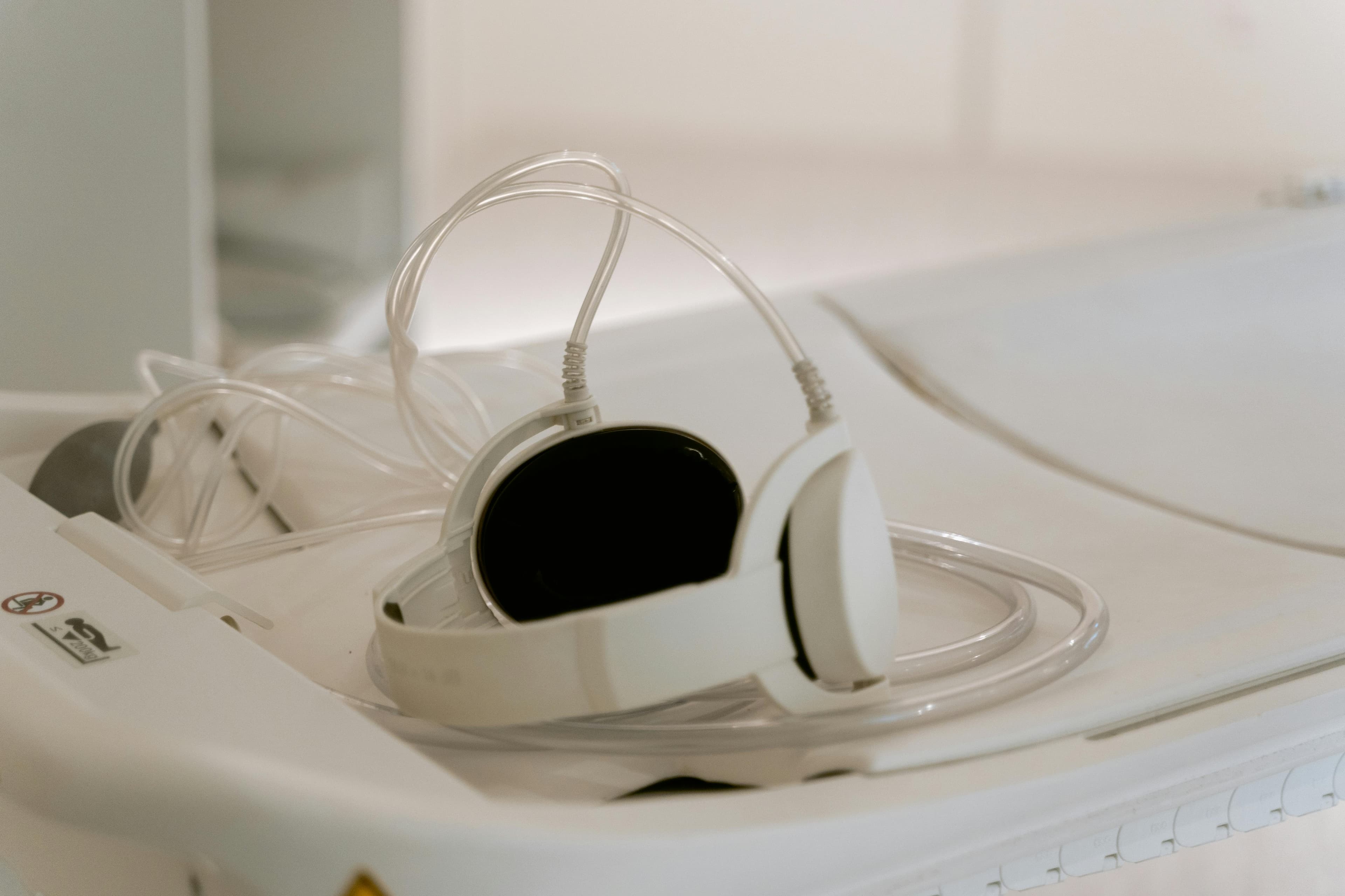 A medical professional performing an ultrasound on a patient, symbolizing careful monitoring during abortion procedures