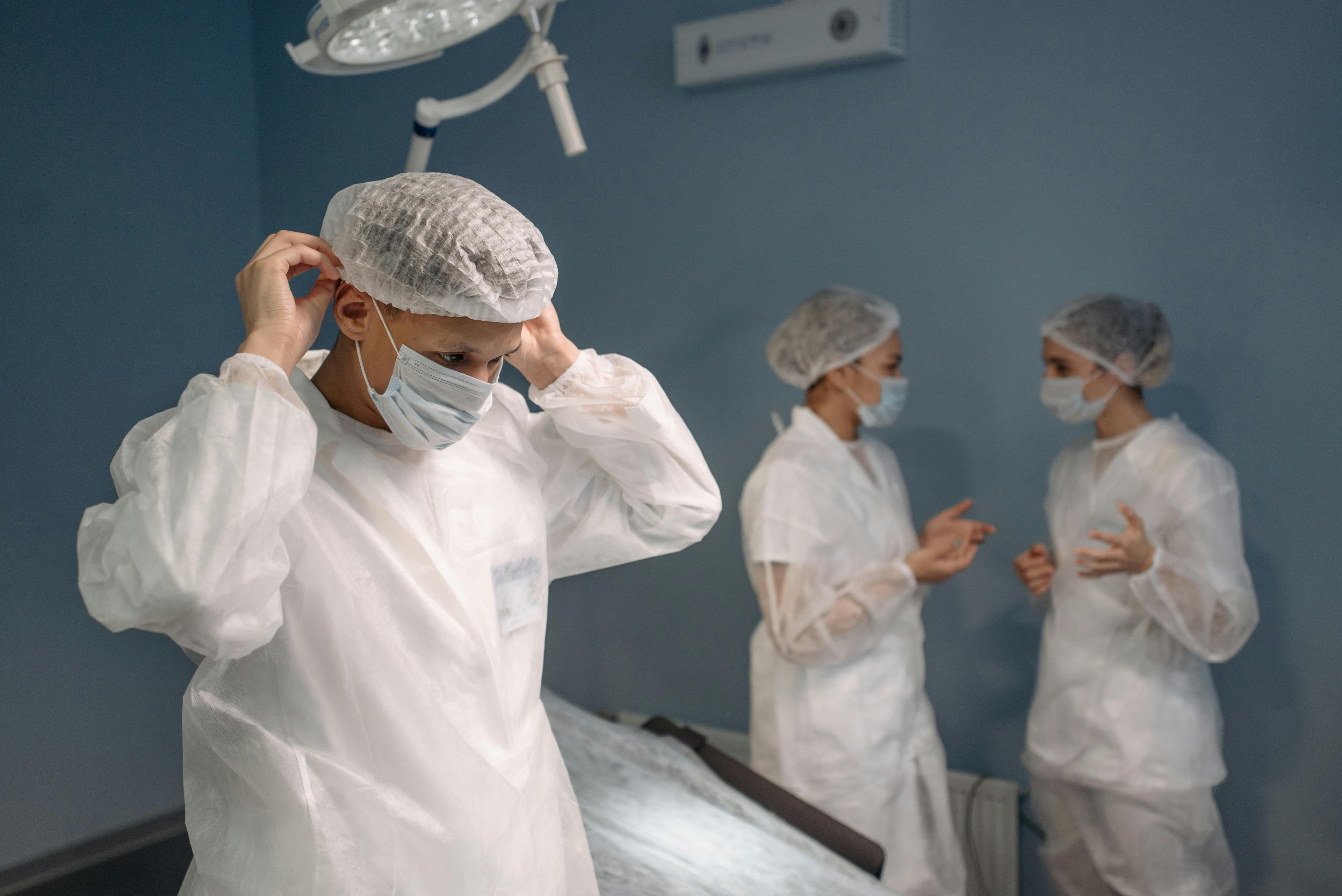 Medical team preparing for a hysteroscopy procedure in an operating room