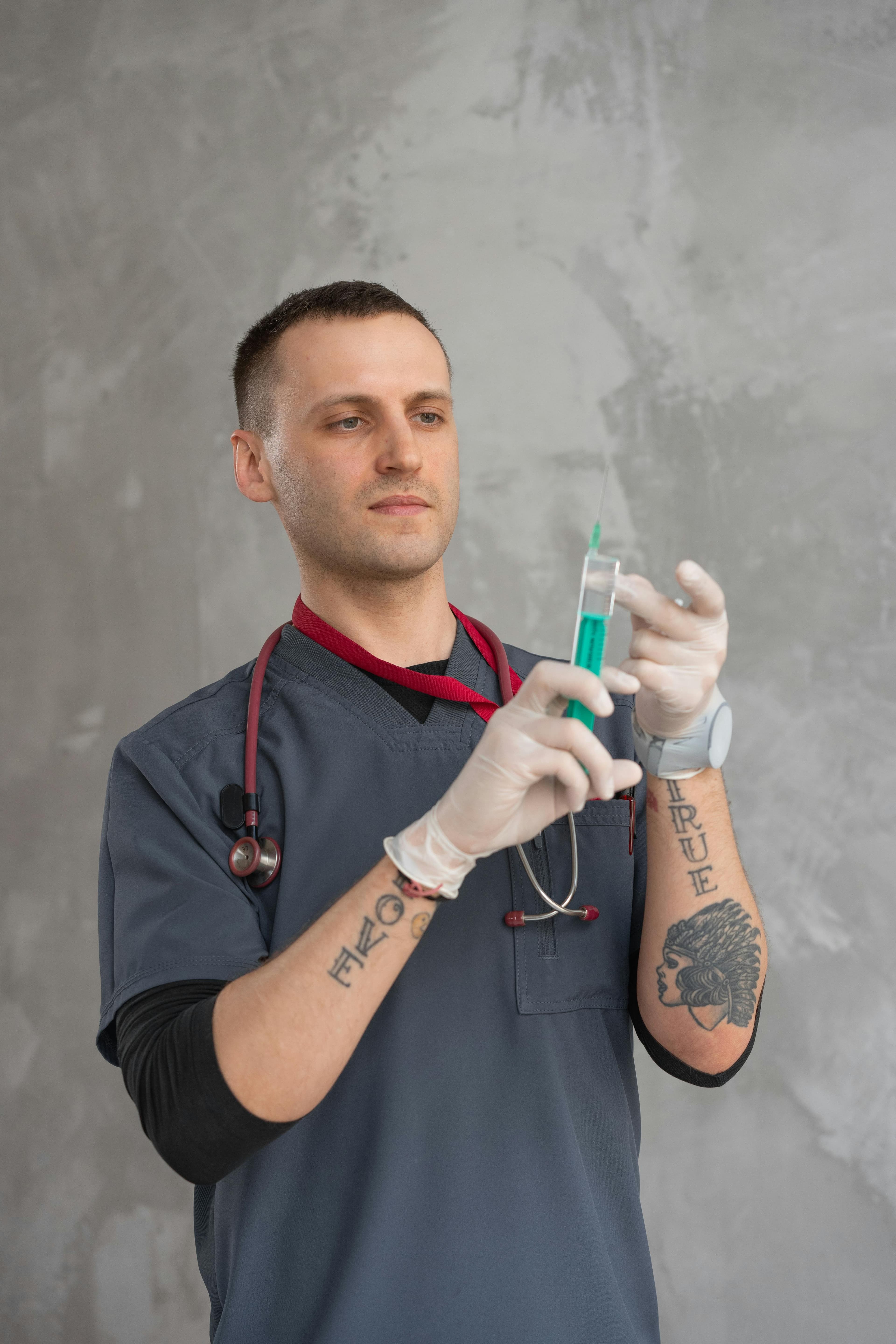 Man preparing an HCG injection for subcutaneous administration