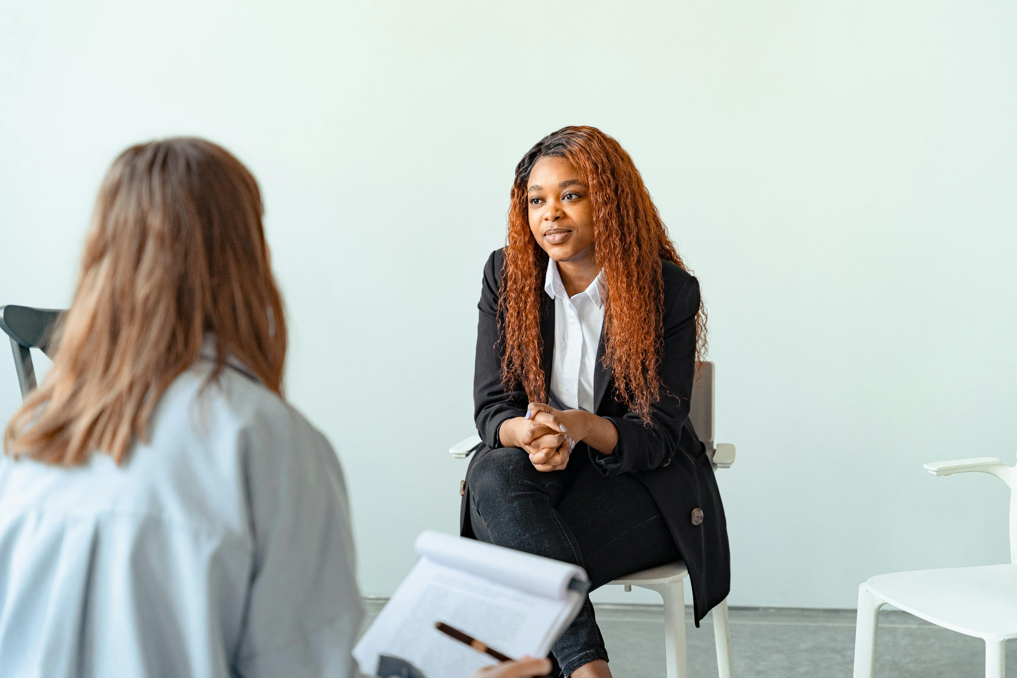 A patient discussing insurance coverage options with a healthcare professional