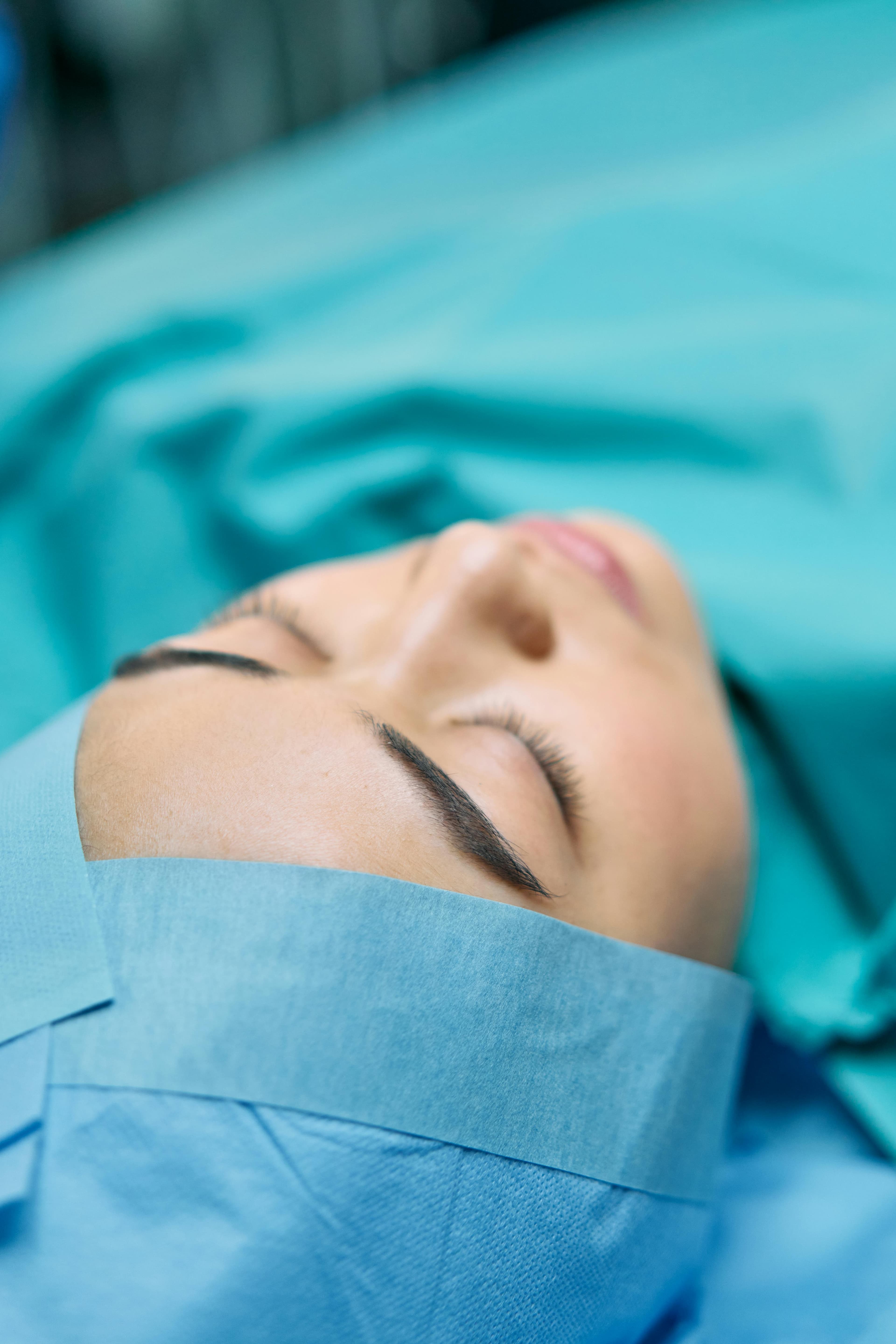 Patient receiving post-operative care instructions from a doctor