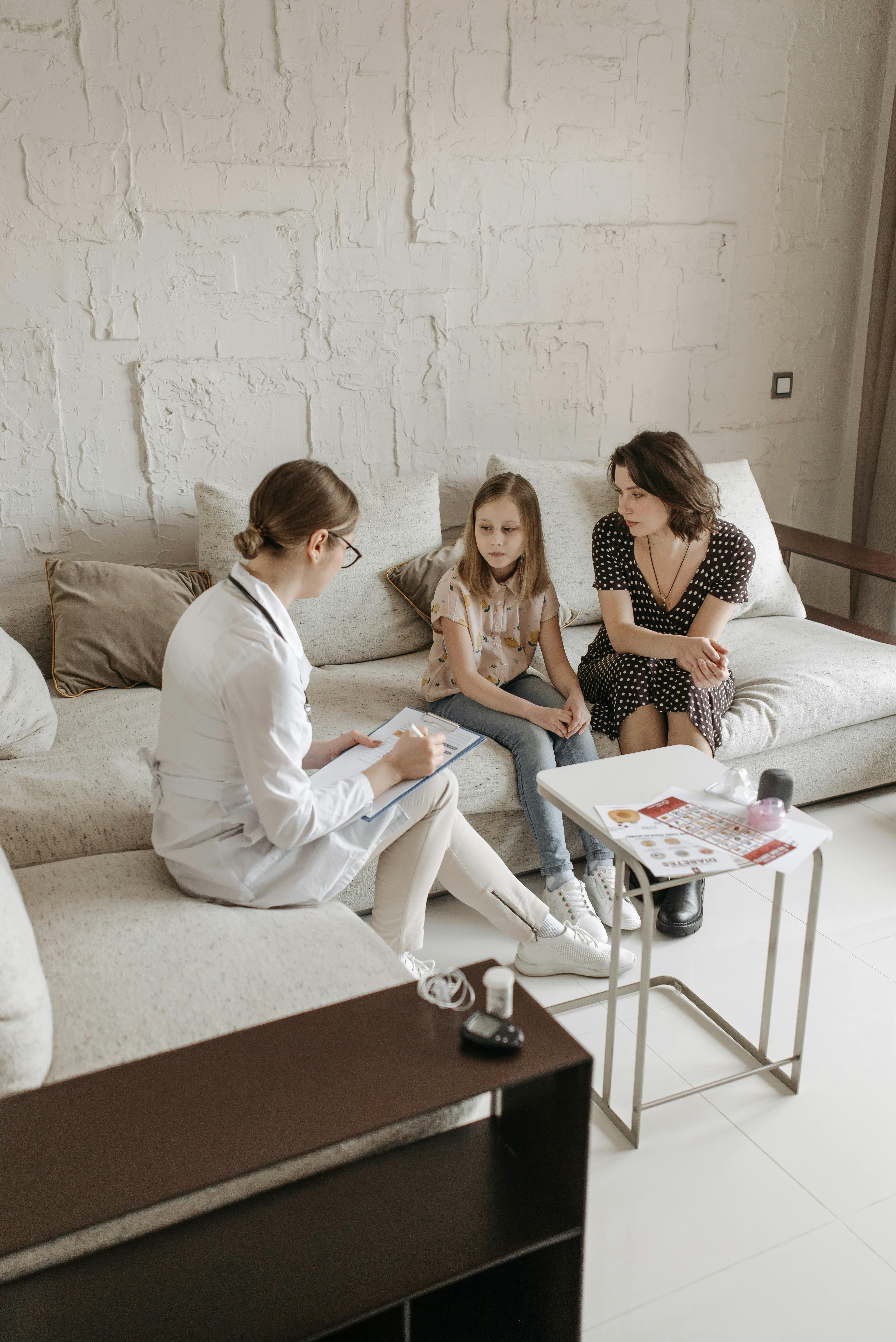 A family doctor consulting with a male patient about testosterone therapy