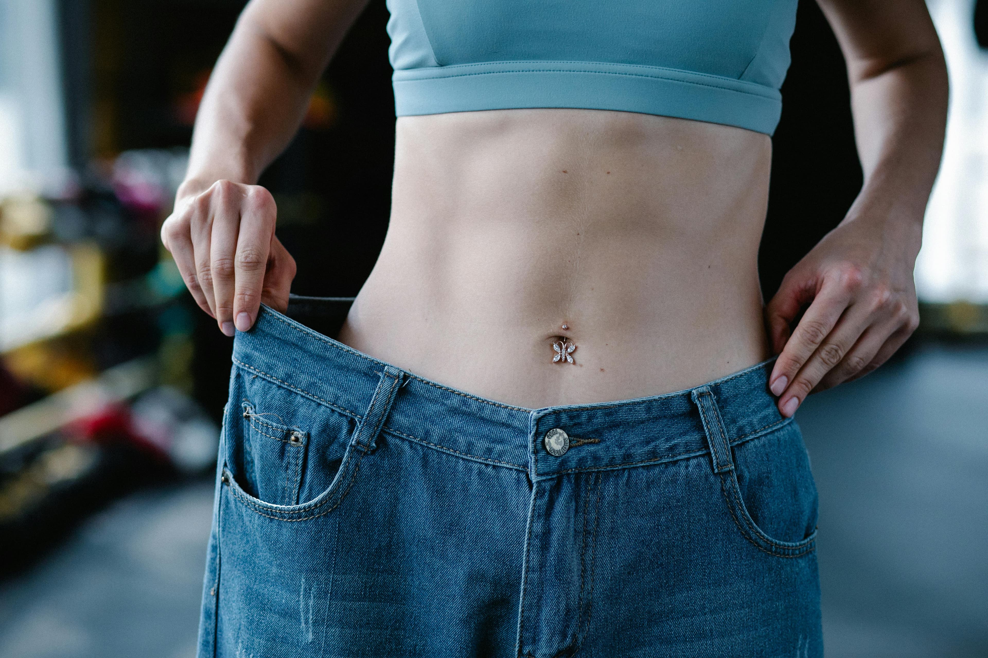 Before and after images showing weight loss transformation