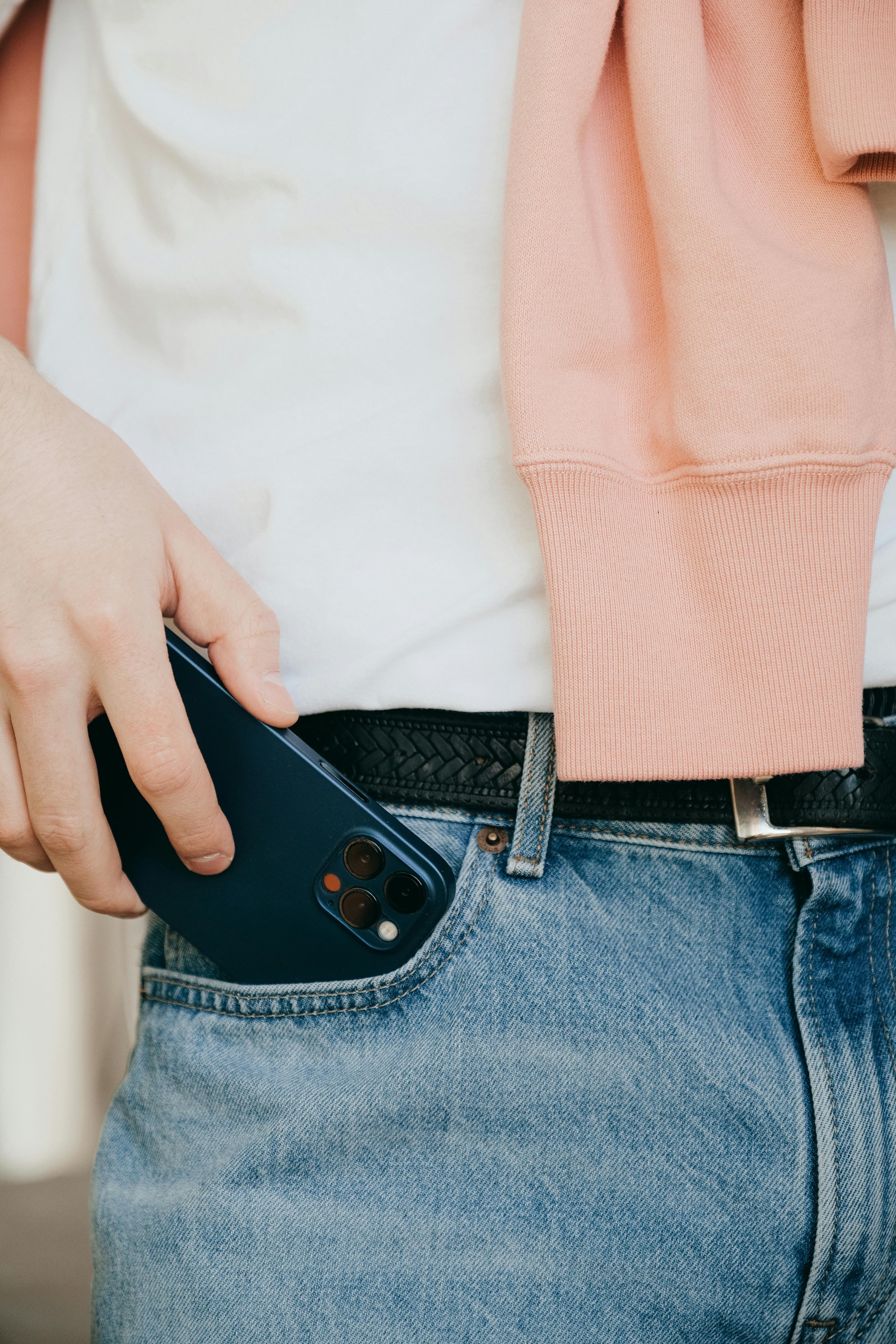 Close-up of a person wearing a hernia support belt or truss