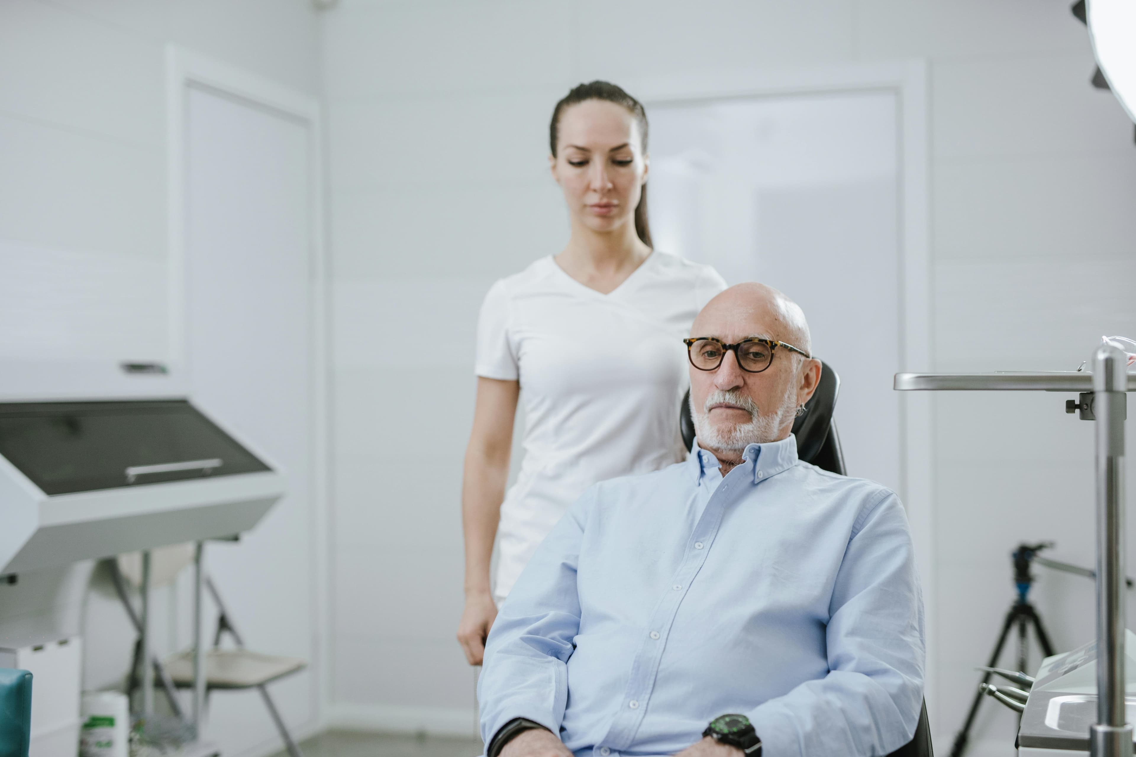 Elderly patient consulting with a doctor about medication