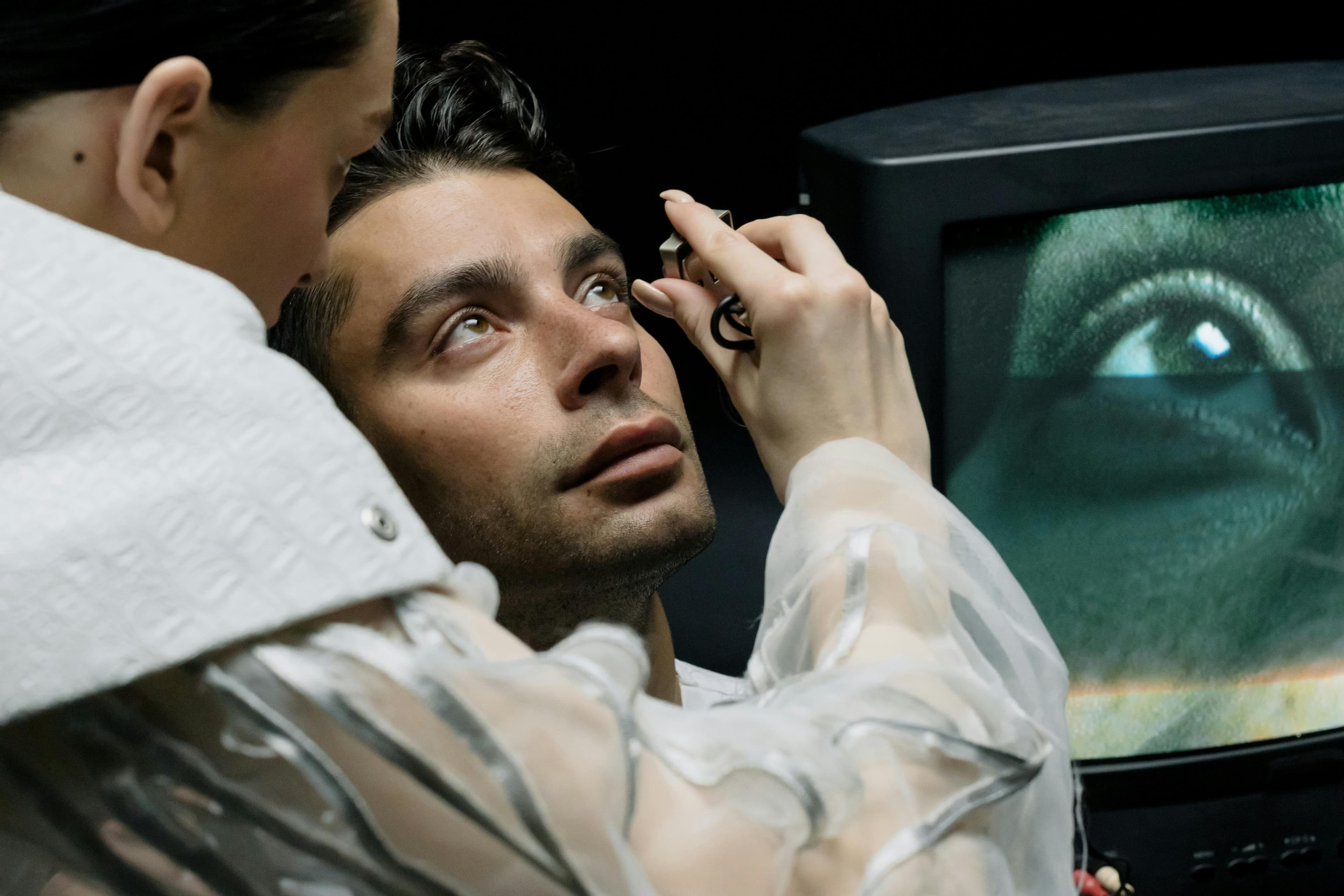 A doctor examining a patient in an urgent care setting