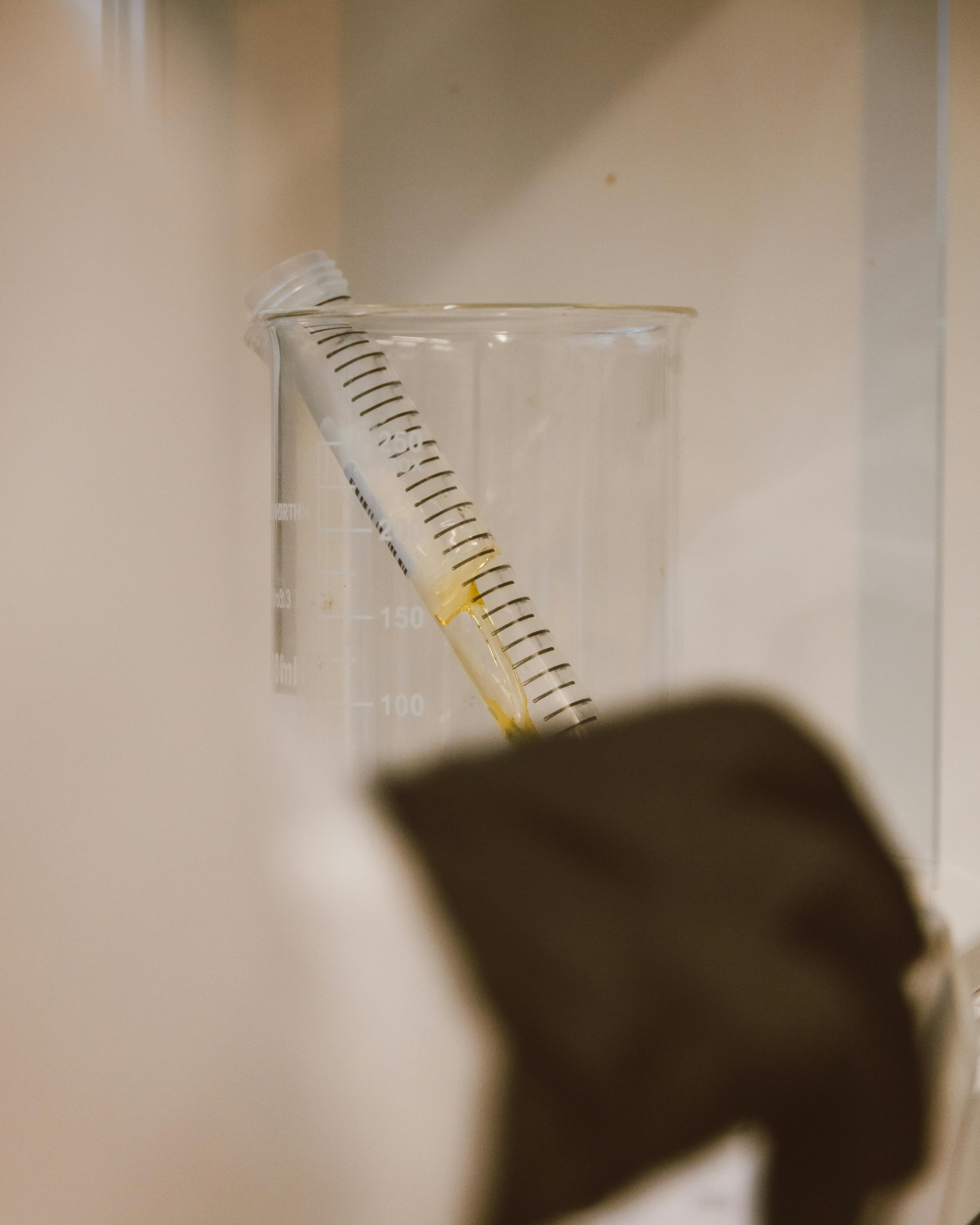 A vial of Jeuveau neurotoxin with measurement markings