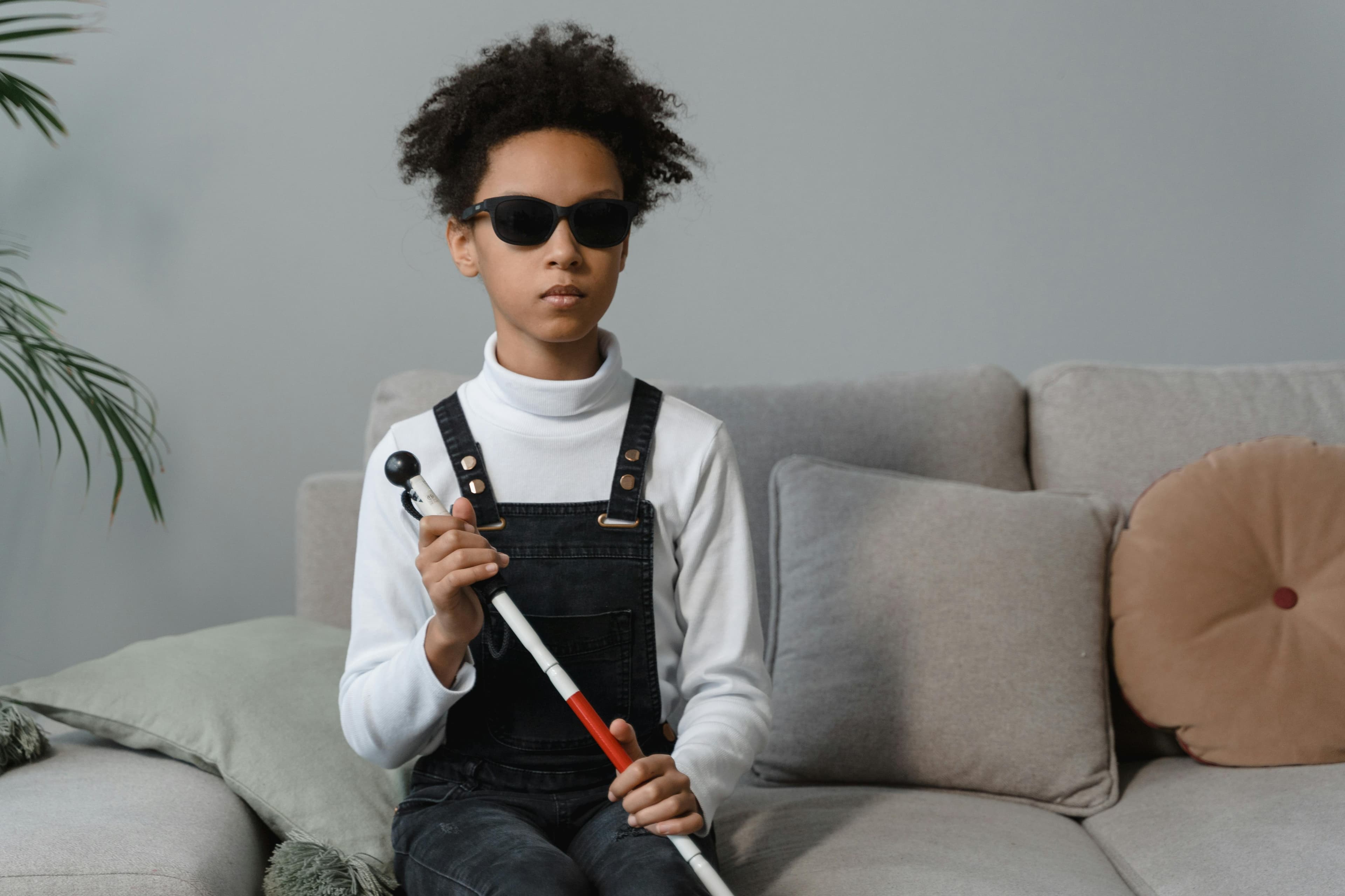 A young child looking uncomfortable and sounding congested