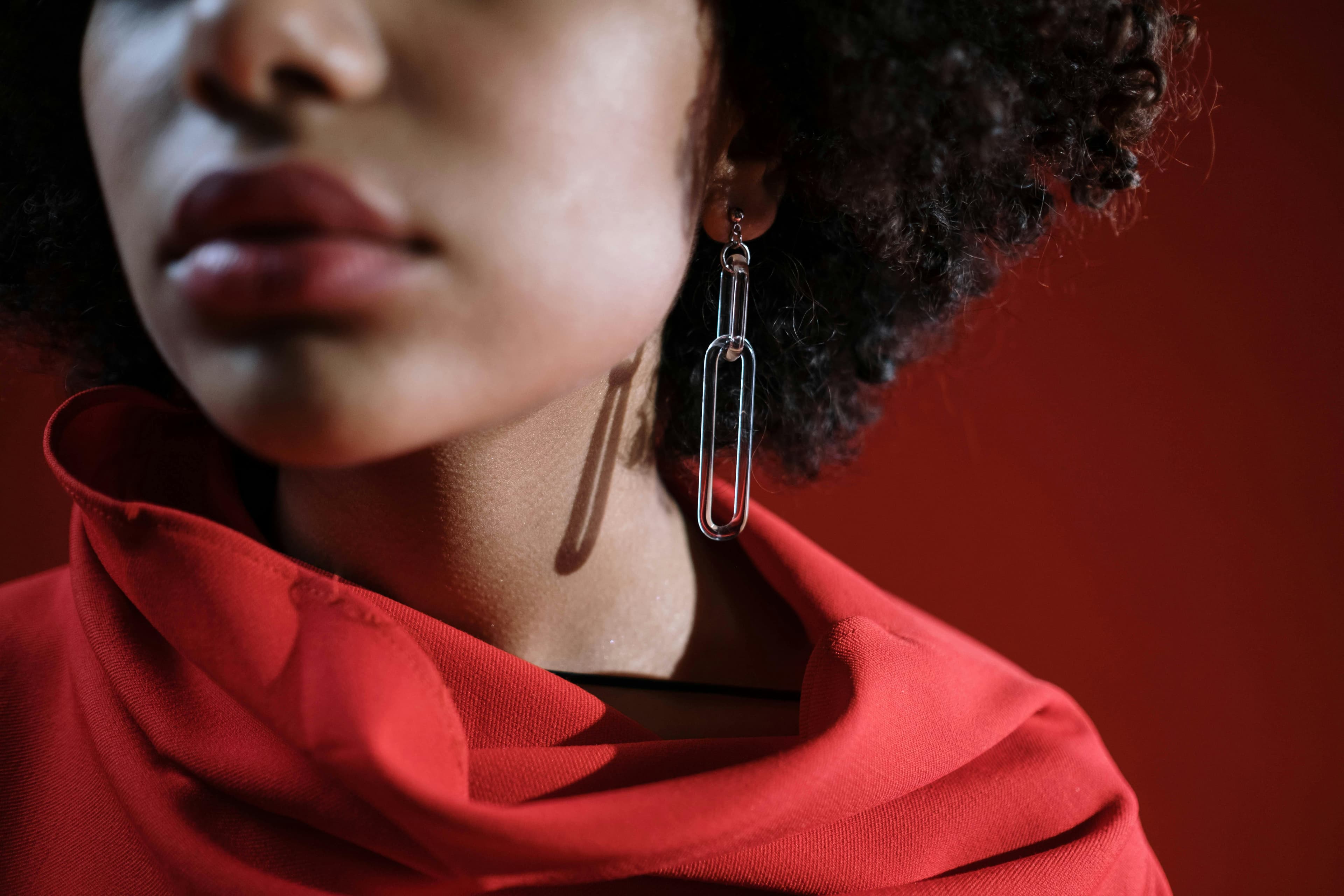 A person with a visibly red and irritated neck area